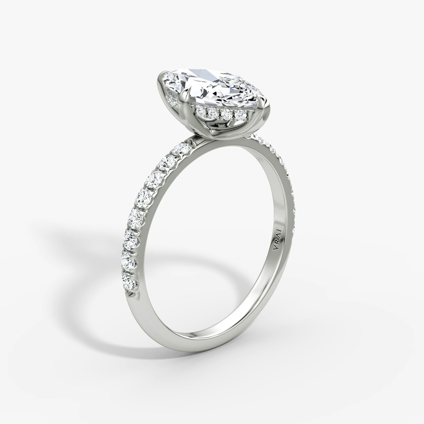 The Classic Hidden Halo | Marquise | Platinum | bandAccent: Pavé | bandWidth: large | prongStyle: Plain | diamondOrientation: vertical | caratWeight: other