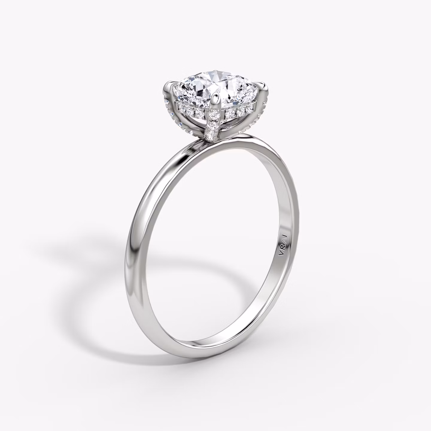 The Classic Hidden Halo | Cushion | Platinum | bandAccent: Plain | bandWidth: large | prongStyle: Pavé | diamondOrientation: vertical | caratWeight: other