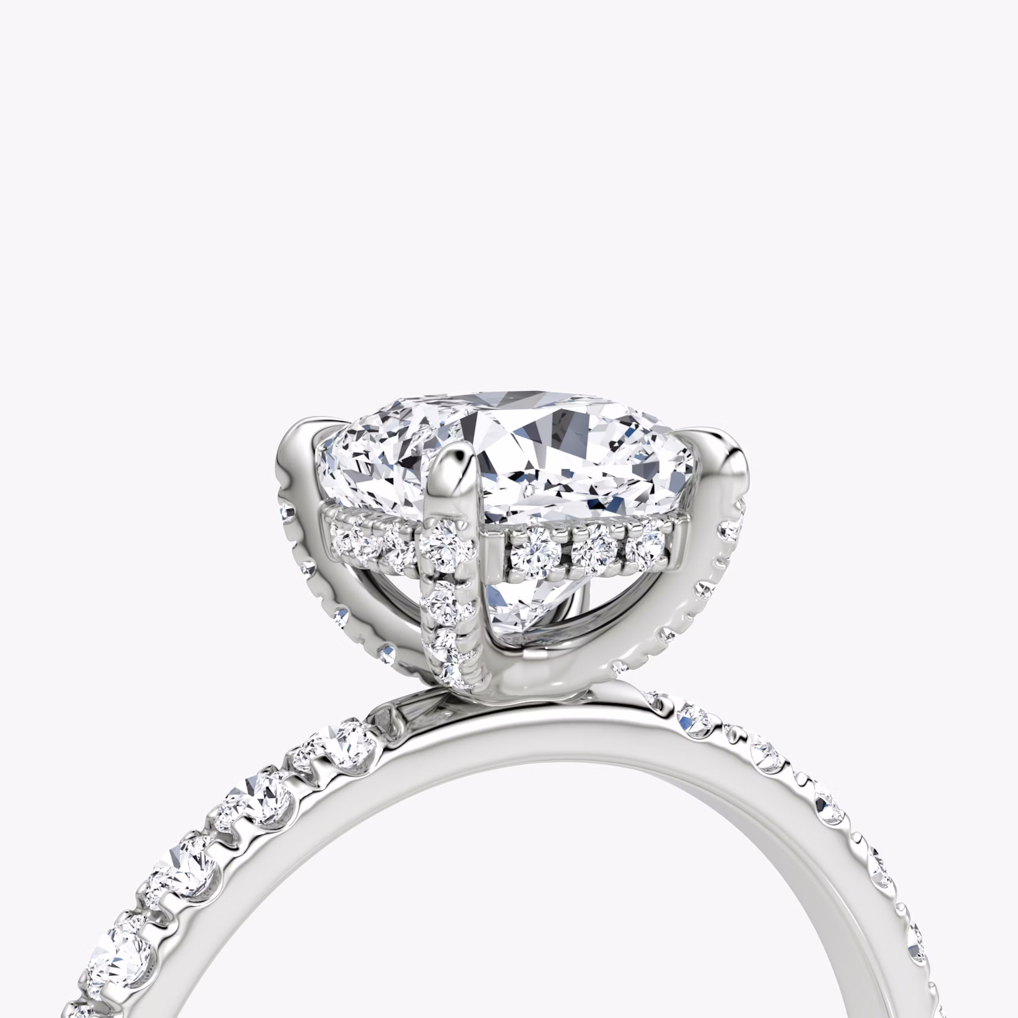 The Classic Hidden Halo | Cushion | Platinum | bandAccent: Pavé | bandWidth: large | prongStyle: Pavé | diamondOrientation: vertical | caratWeight: other