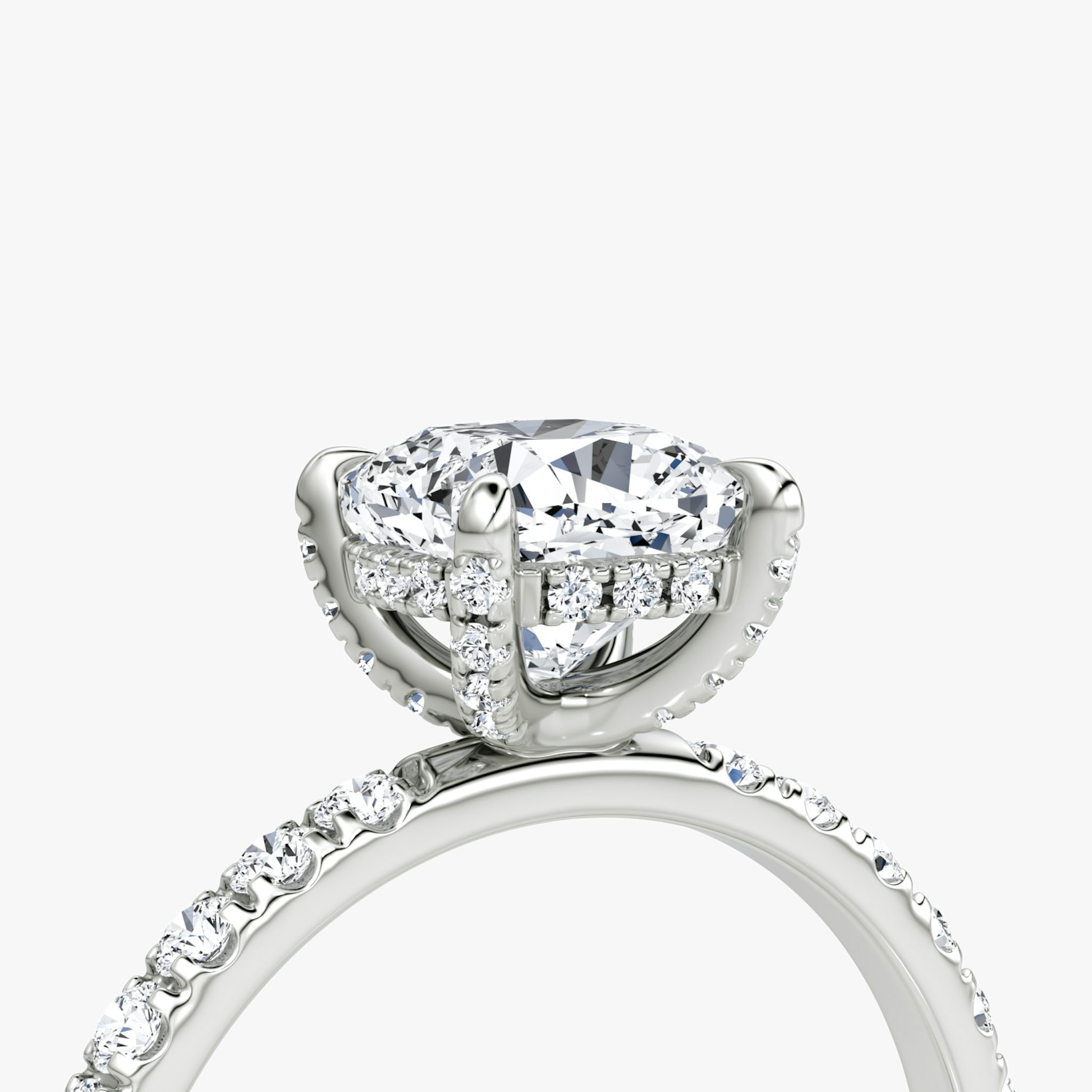 The Classic Hidden Halo | Cushion | Platinum | bandAccent: Pavé | bandWidth: large | prongStyle: Pavé | diamondOrientation: vertical | caratWeight: other