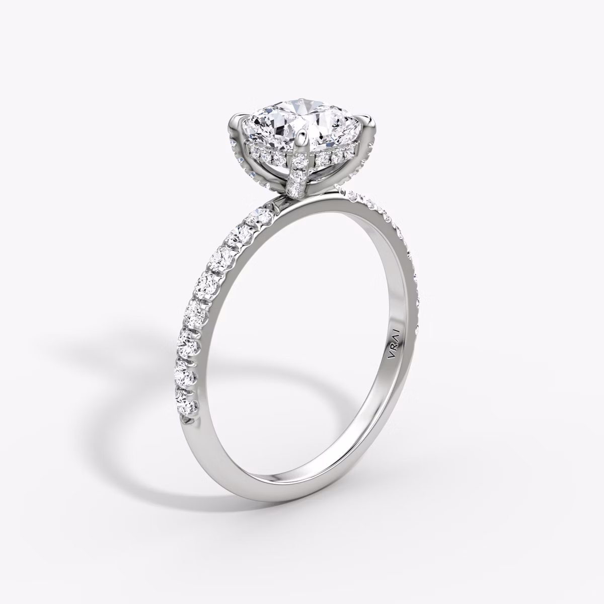 The Classic Hidden Halo | Cushion | 18k | White Gold | bandAccent: Pavé | bandWidth: large | prongStyle: Pavé | diamondOrientation: vertical | caratWeight: other