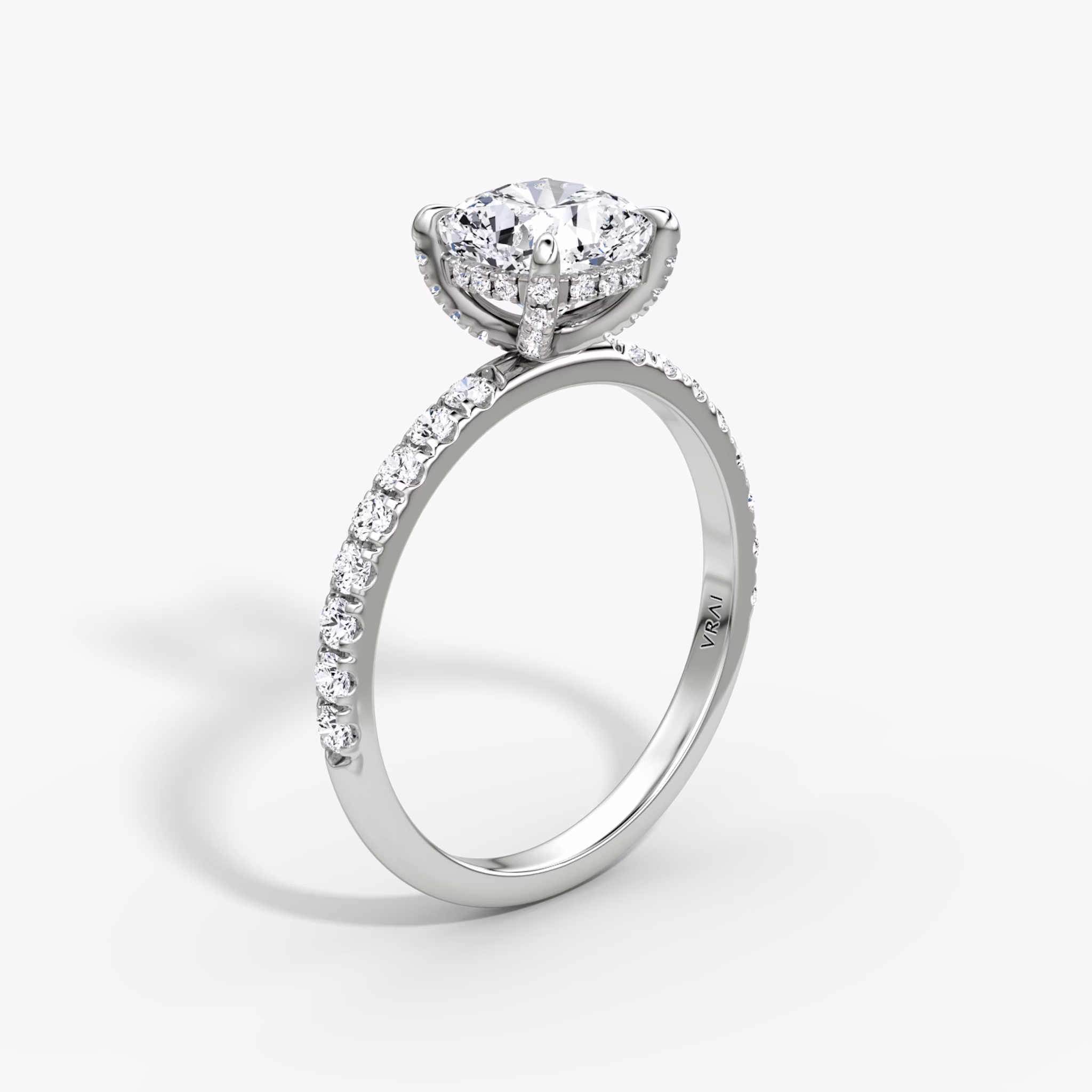 The Classic Hidden Halo | Cushion | Platinum | bandAccent: Pavé | bandWidth: large | prongStyle: Pavé | diamondOrientation: vertical | caratWeight: other