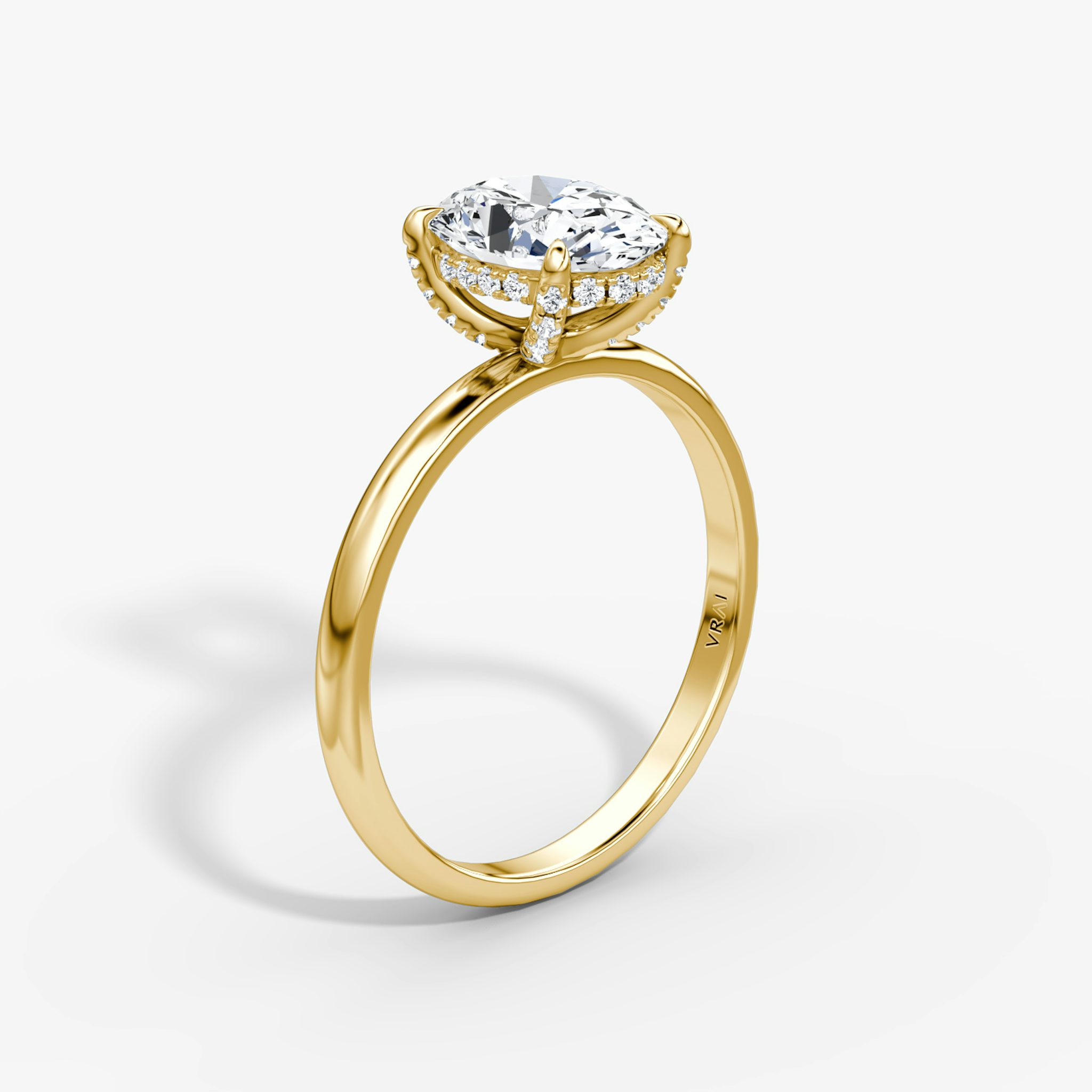 The Classic Hidden Halo | Oval | 18k | Yellow Gold | bandAccent: Plain | bandWidth: large | prongStyle: Pavé | diamondOrientation: vertical | caratWeight: other