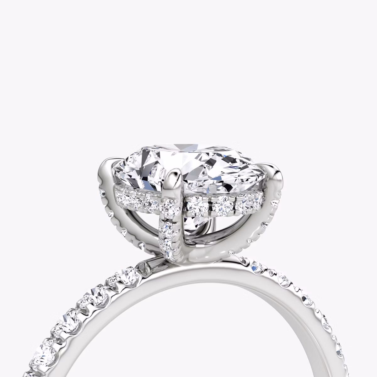 The Classic Hidden Halo | Oval | Platinum | bandAccent: Pavé | bandWidth: large | prongStyle: Pavé | diamondOrientation: vertical | caratWeight: other