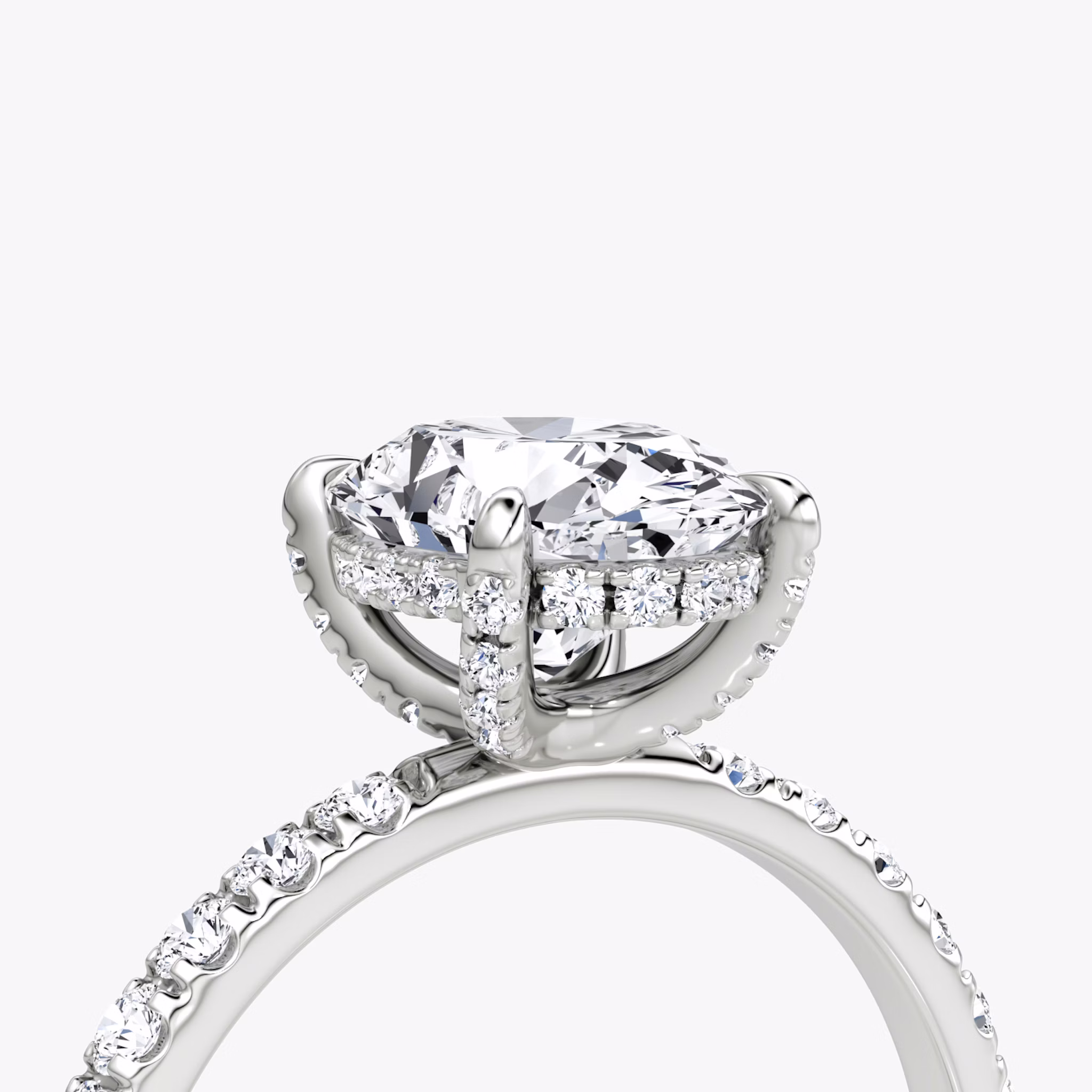 The Classic Hidden Halo | Oval | 18k | White Gold | bandAccent: Pavé | bandWidth: large | prongStyle: Pavé | diamondOrientation: vertical | caratWeight: other