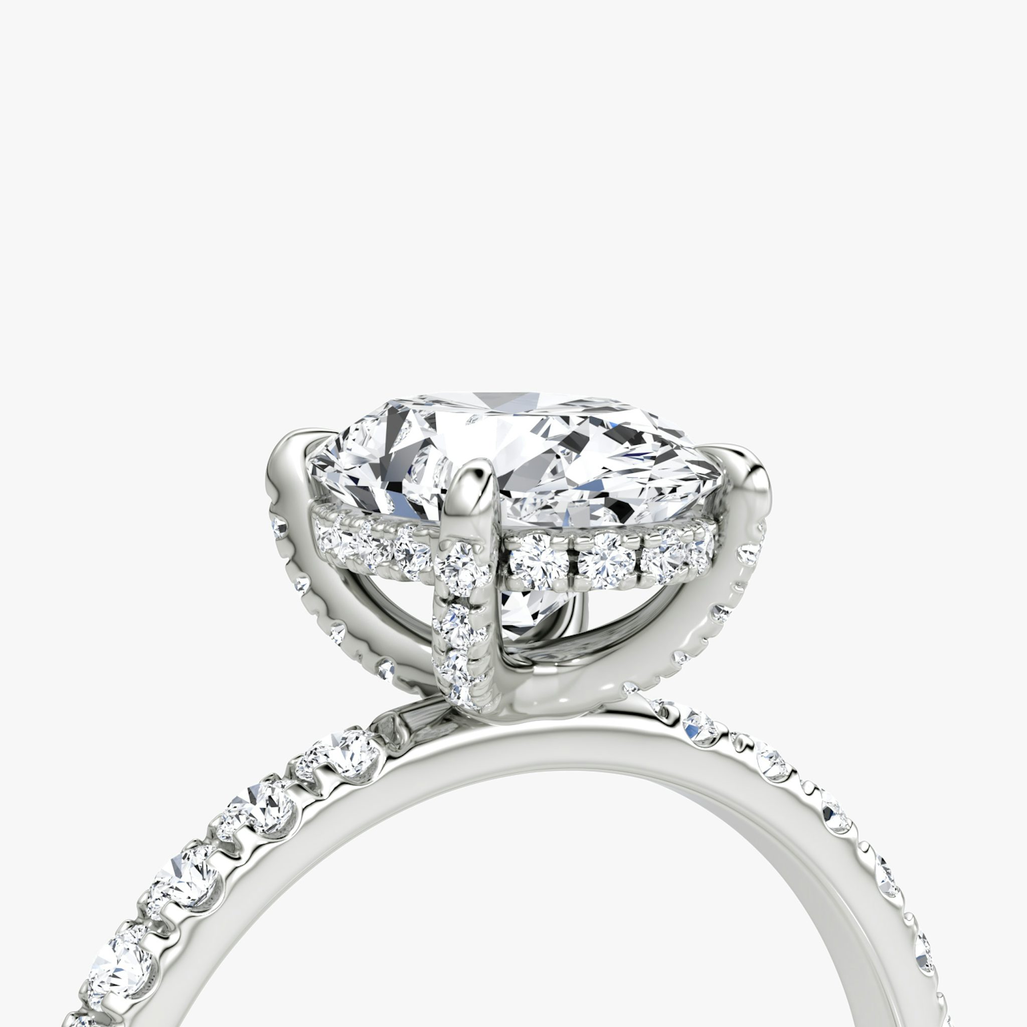The Classic Hidden Halo | Oval | 18k | White Gold | bandAccent: Pavé | bandWidth: large | prongStyle: Pavé | diamondOrientation: vertical | caratWeight: other