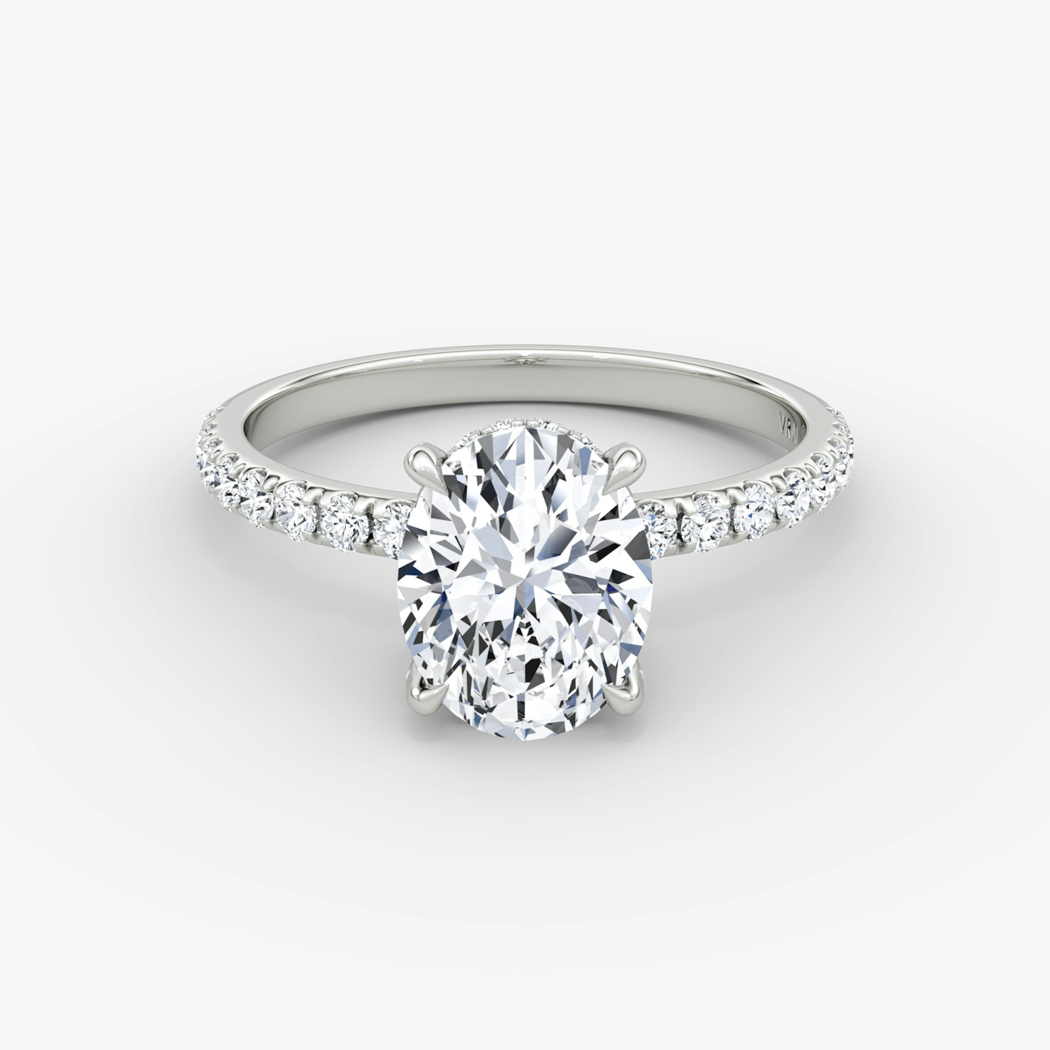 The Classic Hidden Halo | Oval | 18k | White Gold | bandAccent: Pavé | bandWidth: large | prongStyle: Pavé | diamondOrientation: vertical | caratWeight: other