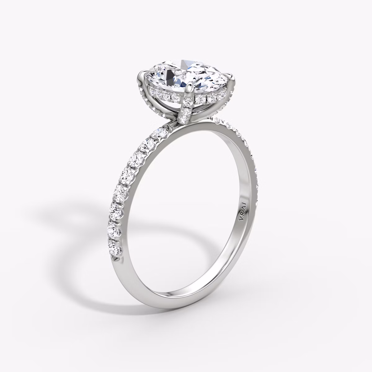 The Classic Hidden Halo | Oval | Platinum | bandAccent: Pavé | bandWidth: large | prongStyle: Pavé | diamondOrientation: vertical | caratWeight: other