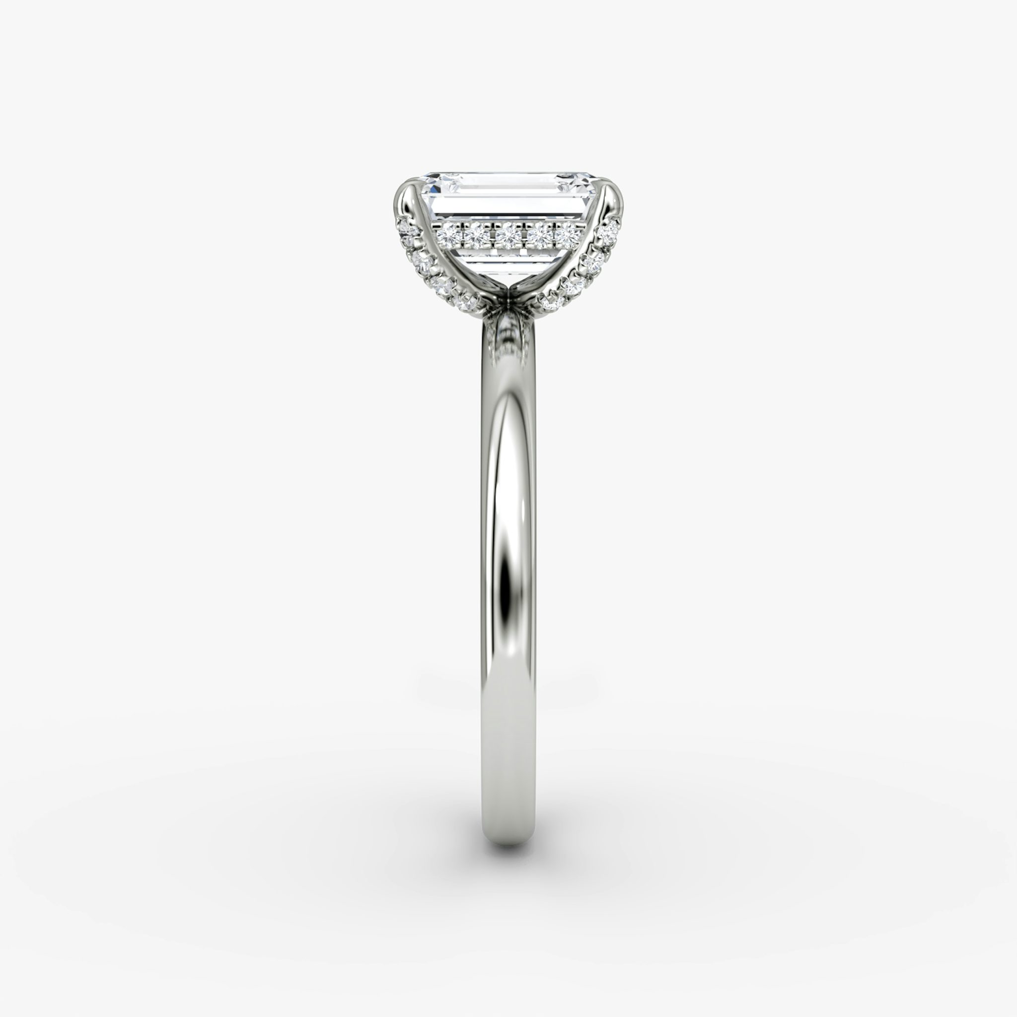 The Classic Hidden Halo | Emerald | Platinum | bandAccent: Plain | bandWidth: large | prongStyle: Pavé | diamondOrientation: vertical | caratWeight: other