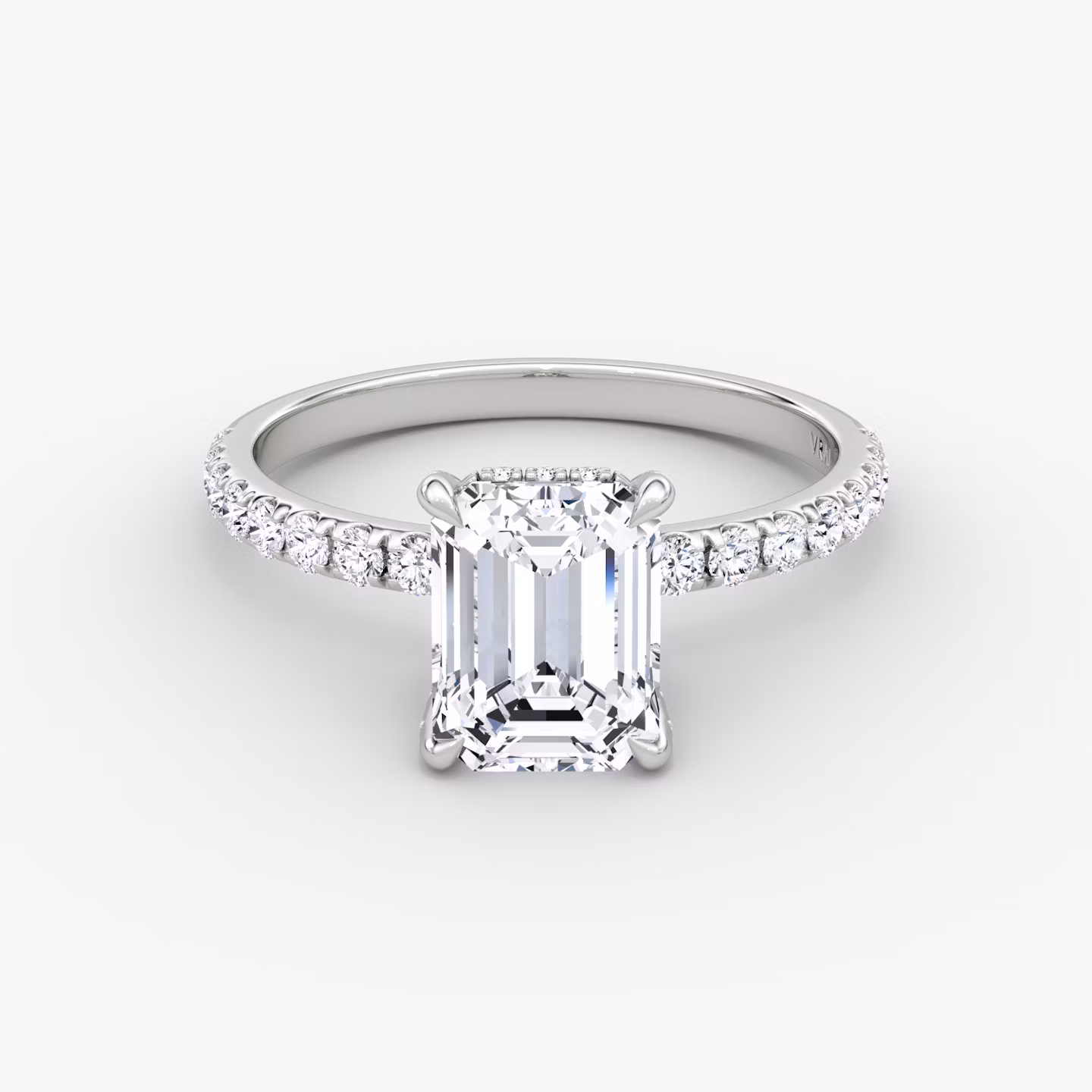 The Classic Hidden Halo | Emerald | 18k | White Gold | bandAccent: Pavé | bandWidth: large | prongStyle: Pavé | diamondOrientation: vertical | caratWeight: other