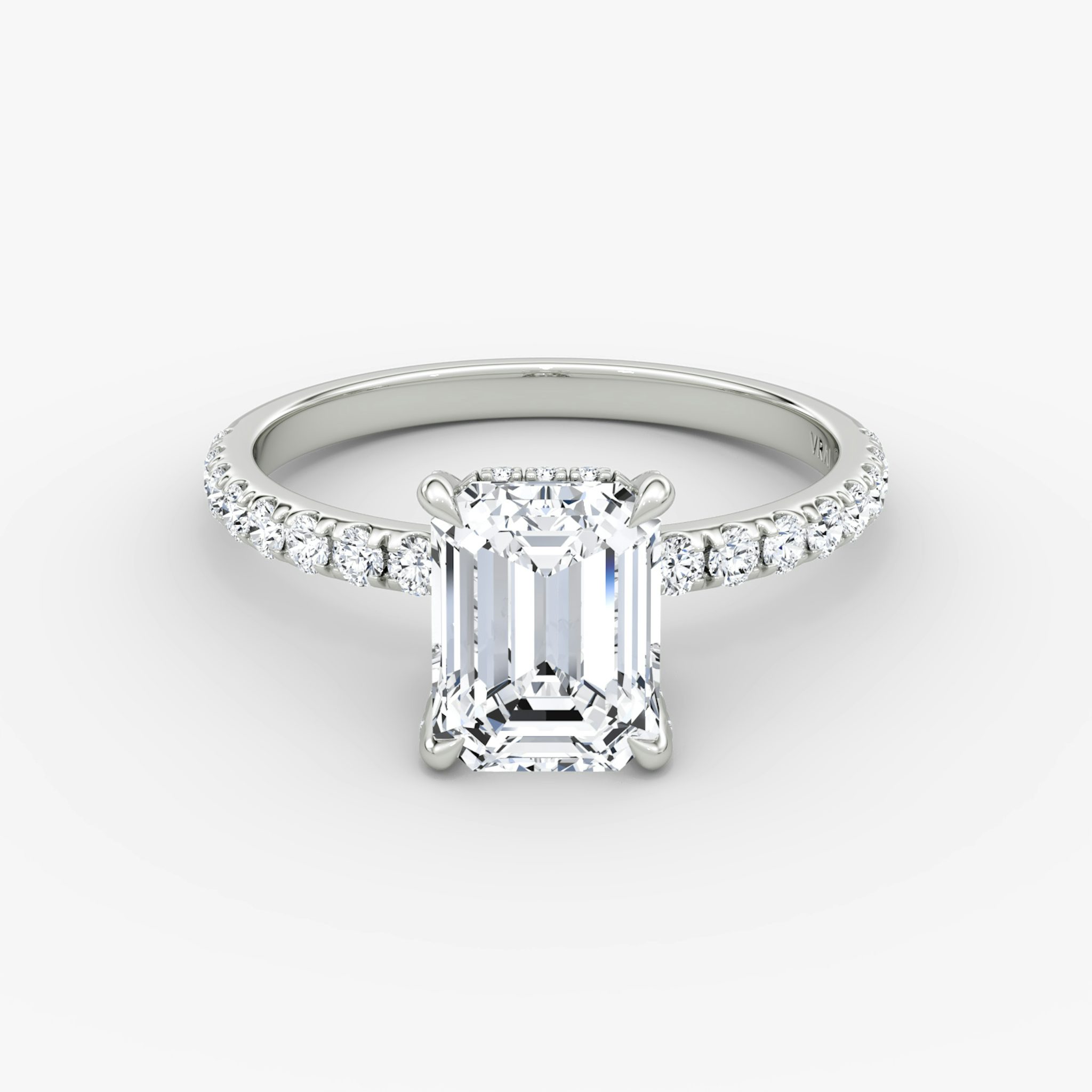 The Classic Hidden Halo | Emerald | 18k | White Gold | bandAccent: Pavé | bandWidth: large | prongStyle: Pavé | diamondOrientation: vertical | caratWeight: other