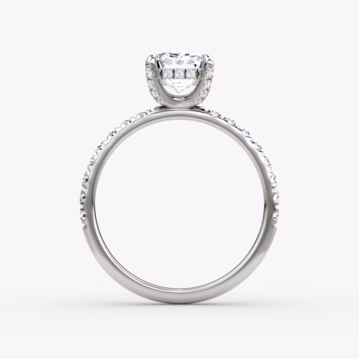 The Classic Hidden Halo | Emerald | Platinum | bandAccent: Pavé | bandWidth: large | prongStyle: Pavé | diamondOrientation: vertical | caratWeight: other