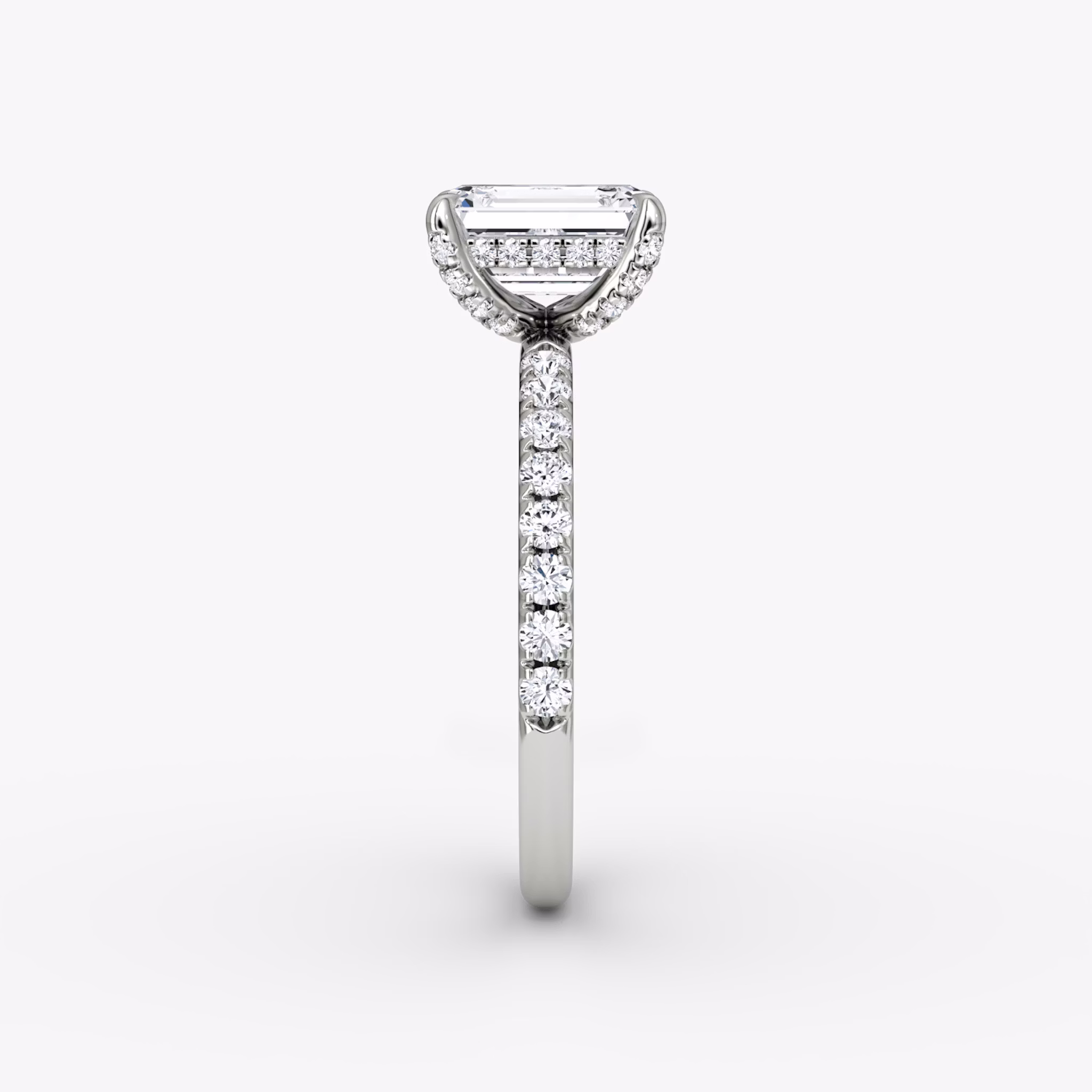 The Classic Hidden Halo | Emerald | 18k | White Gold | bandAccent: Pavé | bandWidth: large | prongStyle: Pavé | diamondOrientation: vertical | caratWeight: other