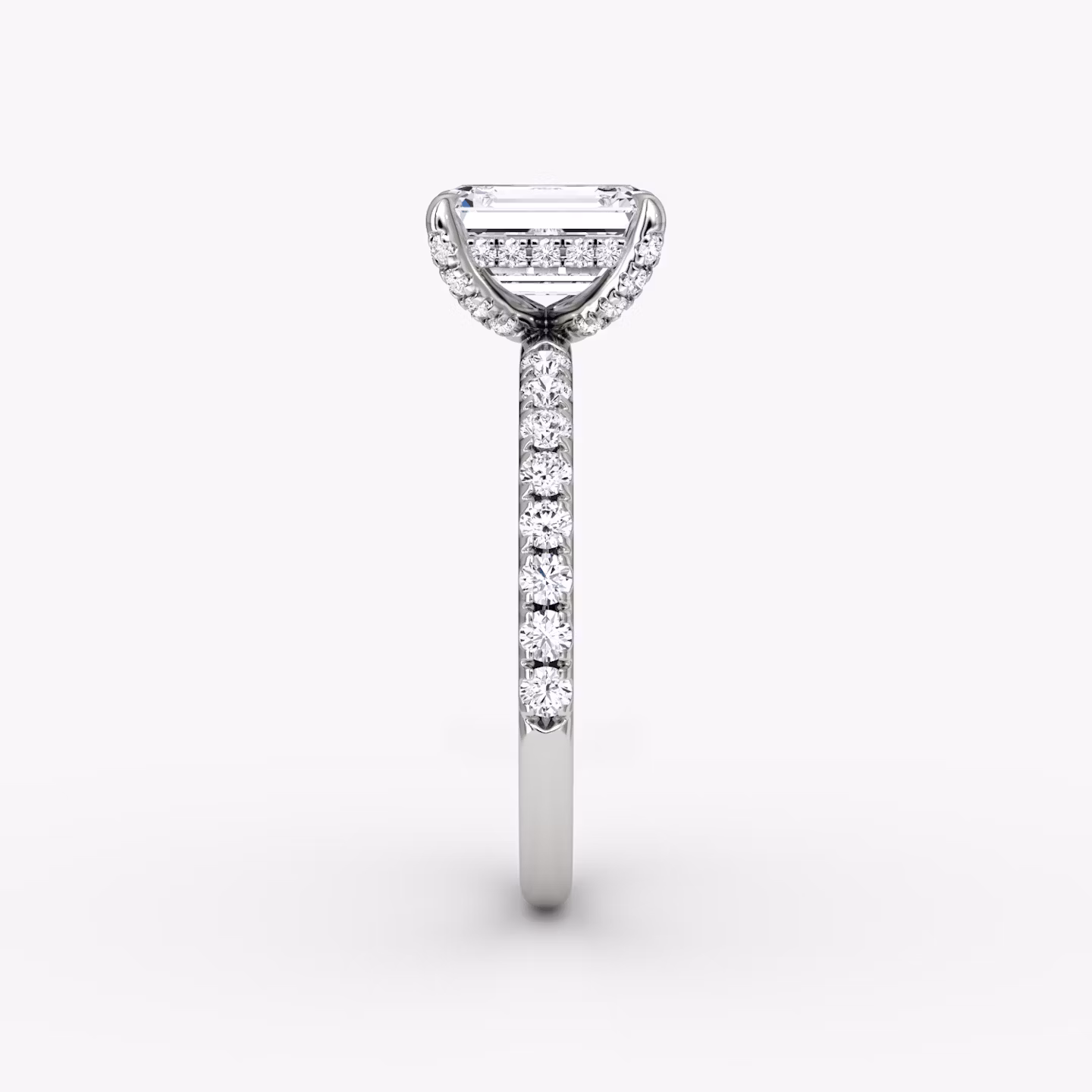 The Classic Hidden Halo | Emerald | 18k | White Gold | bandAccent: Pavé | bandWidth: large | prongStyle: Pavé | diamondOrientation: vertical | caratWeight: other