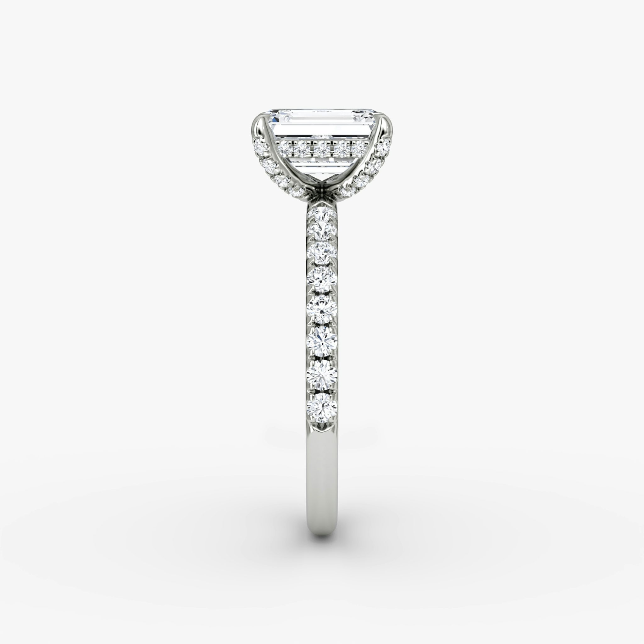 The Classic Hidden Halo | Emerald | 18k | White Gold | bandAccent: Pavé | bandWidth: large | prongStyle: Pavé | diamondOrientation: vertical | caratWeight: other