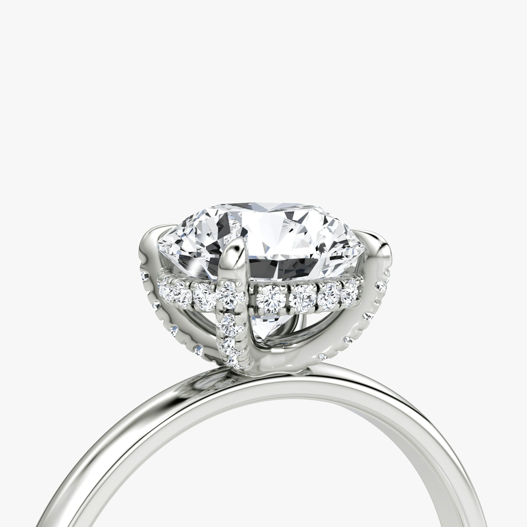 The Classic Hidden Halo | Round Brilliant | Platinum | bandAccent: Plain | bandWidth: large | caratWeight: 1.0ct | prongStyle: Pavé | diamondOrientation: vertical
