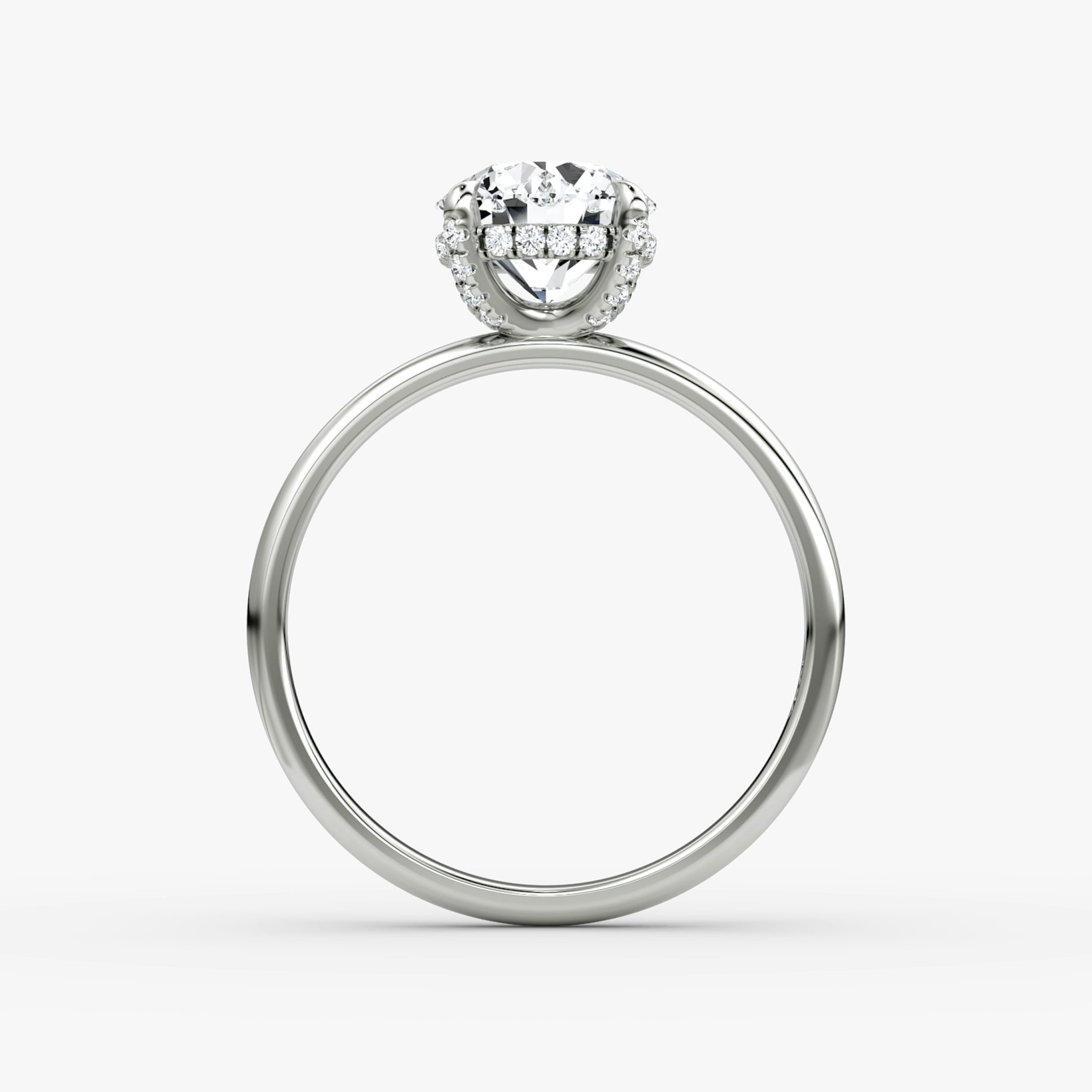 The Classic Hidden Halo | Round Brilliant | Platinum | bandAccent: Plain | bandWidth: large | caratWeight: 1.0ct | prongStyle: Pavé | diamondOrientation: vertical