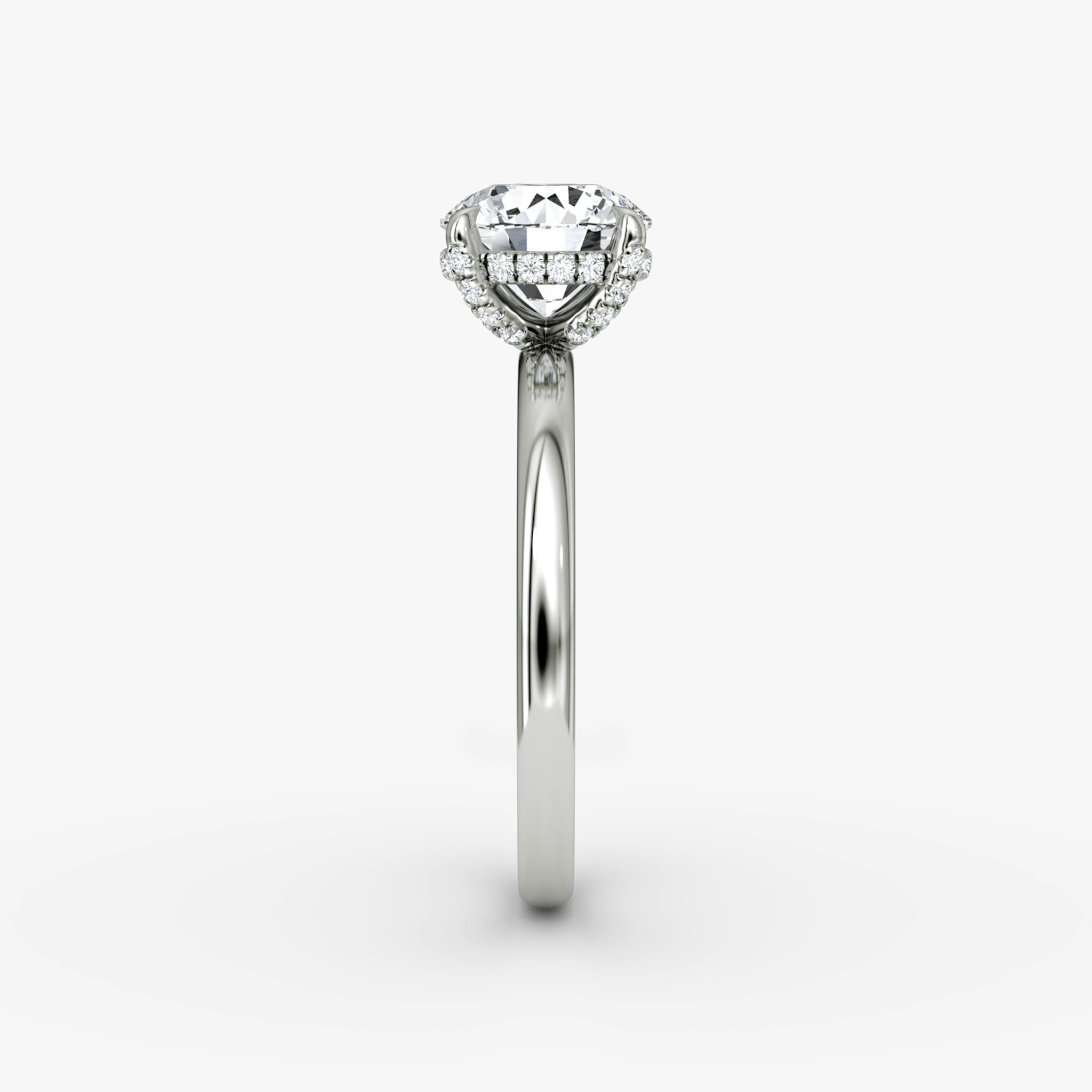 The Classic Hidden Halo | Round Brilliant | Platinum | bandAccent: Plain | bandWidth: large | caratWeight: 1.0ct | prongStyle: Pavé | diamondOrientation: vertical
