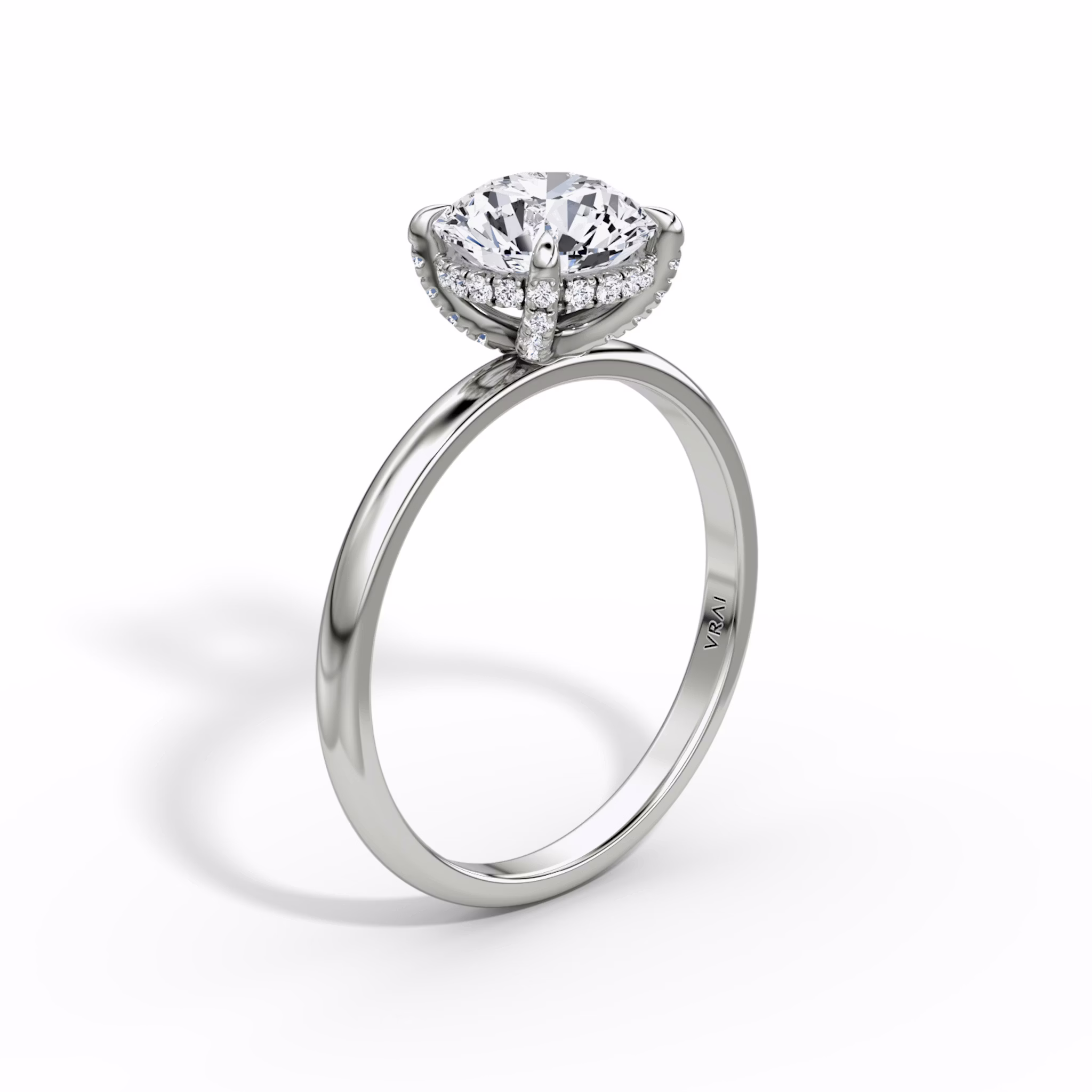 The Classic Hidden Halo | Round Brilliant | Platinum | bandAccent: Plain | bandWidth: large | caratWeight: 1.0ct | prongStyle: Pavé | diamondOrientation: vertical
