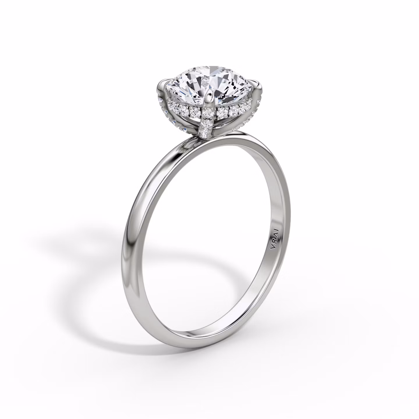 The Classic Hidden Halo | Round Brilliant | 18k | White Gold | bandAccent: Plain | bandWidth: large | caratWeight: 2.0ct | prongStyle: Pavé | diamondOrientation: vertical