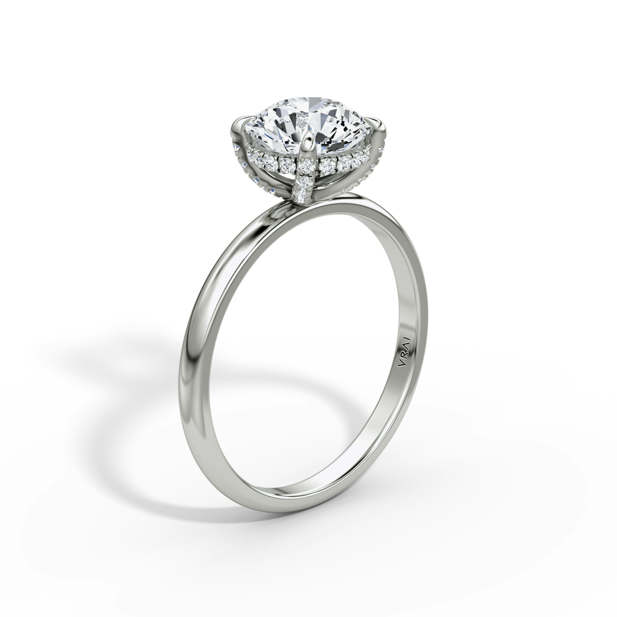 The Classic Hidden Halo | Round Brilliant | Platinum | bandAccent: Plain | bandWidth: large | caratWeight: 1.0ct | prongStyle: Pavé | diamondOrientation: vertical