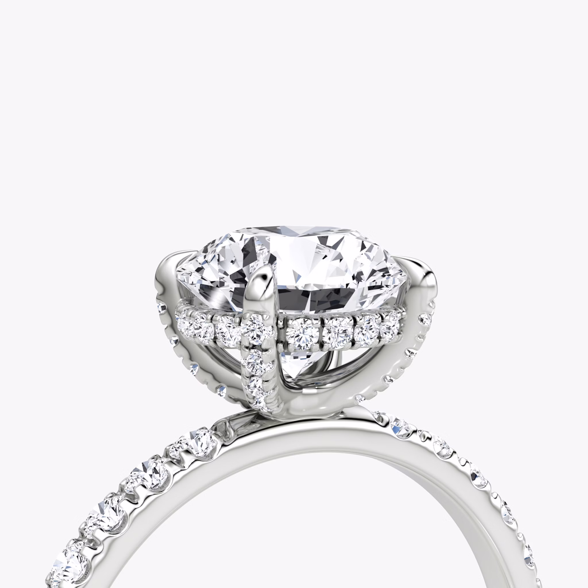 The Classic Hidden Halo | Round Brilliant | 18k | White Gold | bandAccent: Pavé | bandWidth: large | caratWeight: 1.0ct | prongStyle: Pavé | diamondOrientation: vertical