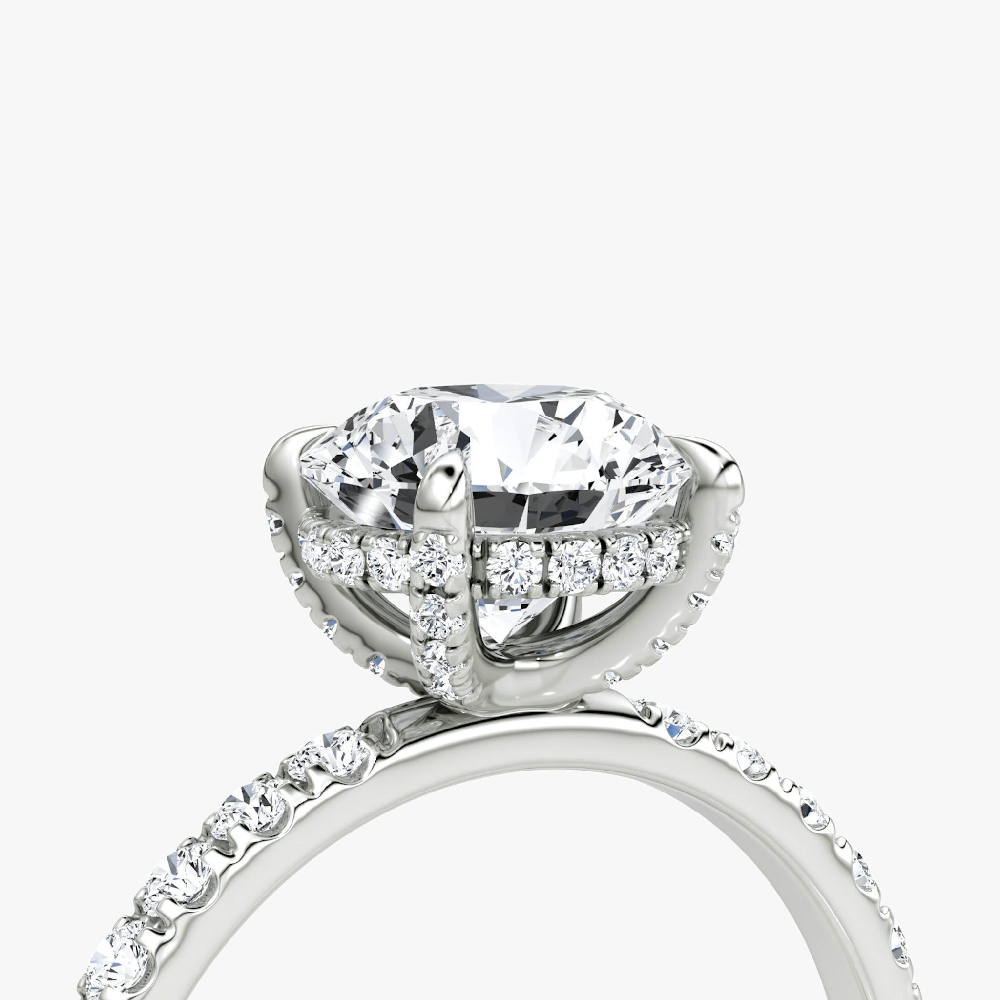 The Classic Hidden Halo | Round Brilliant | 18k | White Gold | bandAccent: Pavé | bandWidth: large | caratWeight: 1.0ct | prongStyle: Pavé | diamondOrientation: vertical