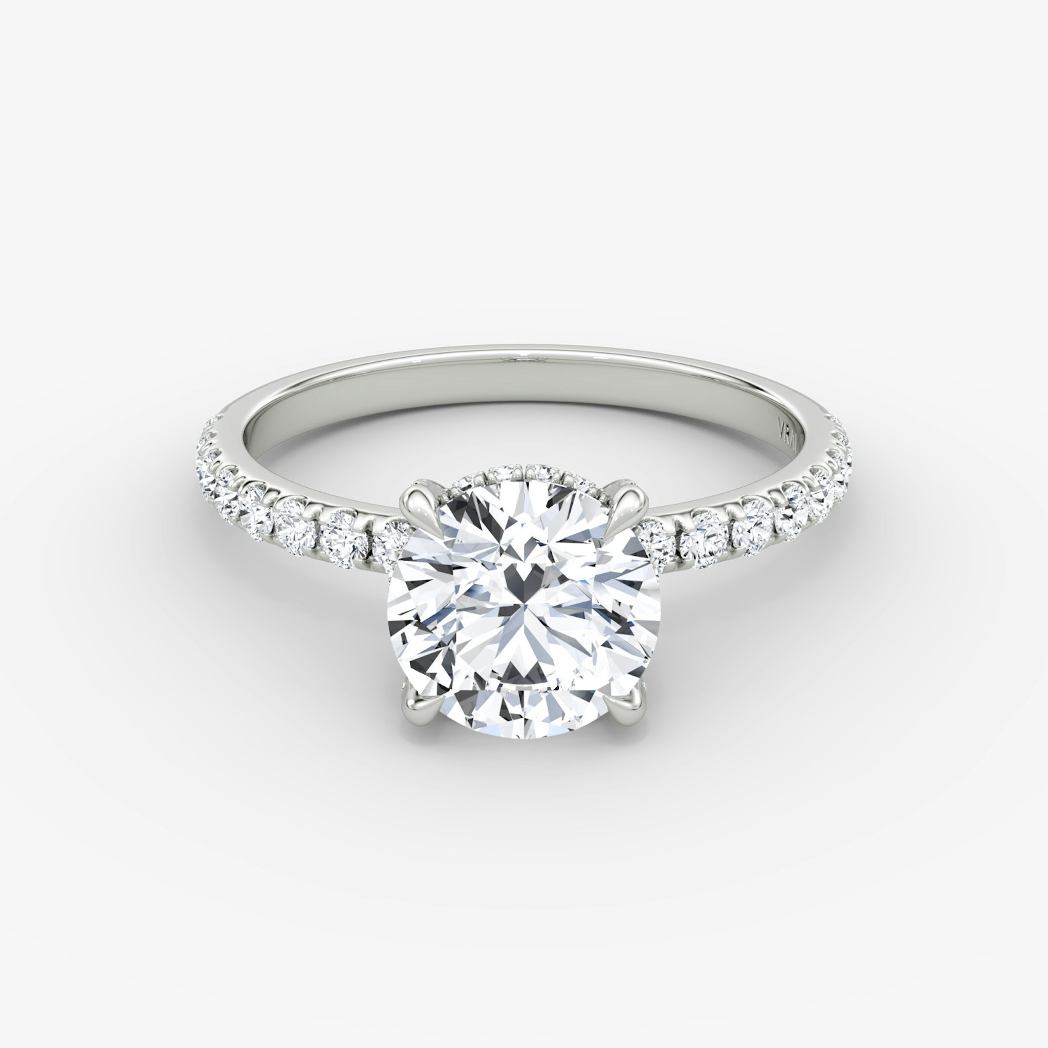 The Classic Hidden Halo | Round Brilliant | 18k | White Gold | bandAccent: Pavé | bandWidth: large | caratWeight: 1.0ct | prongStyle: Pavé | diamondOrientation: vertical