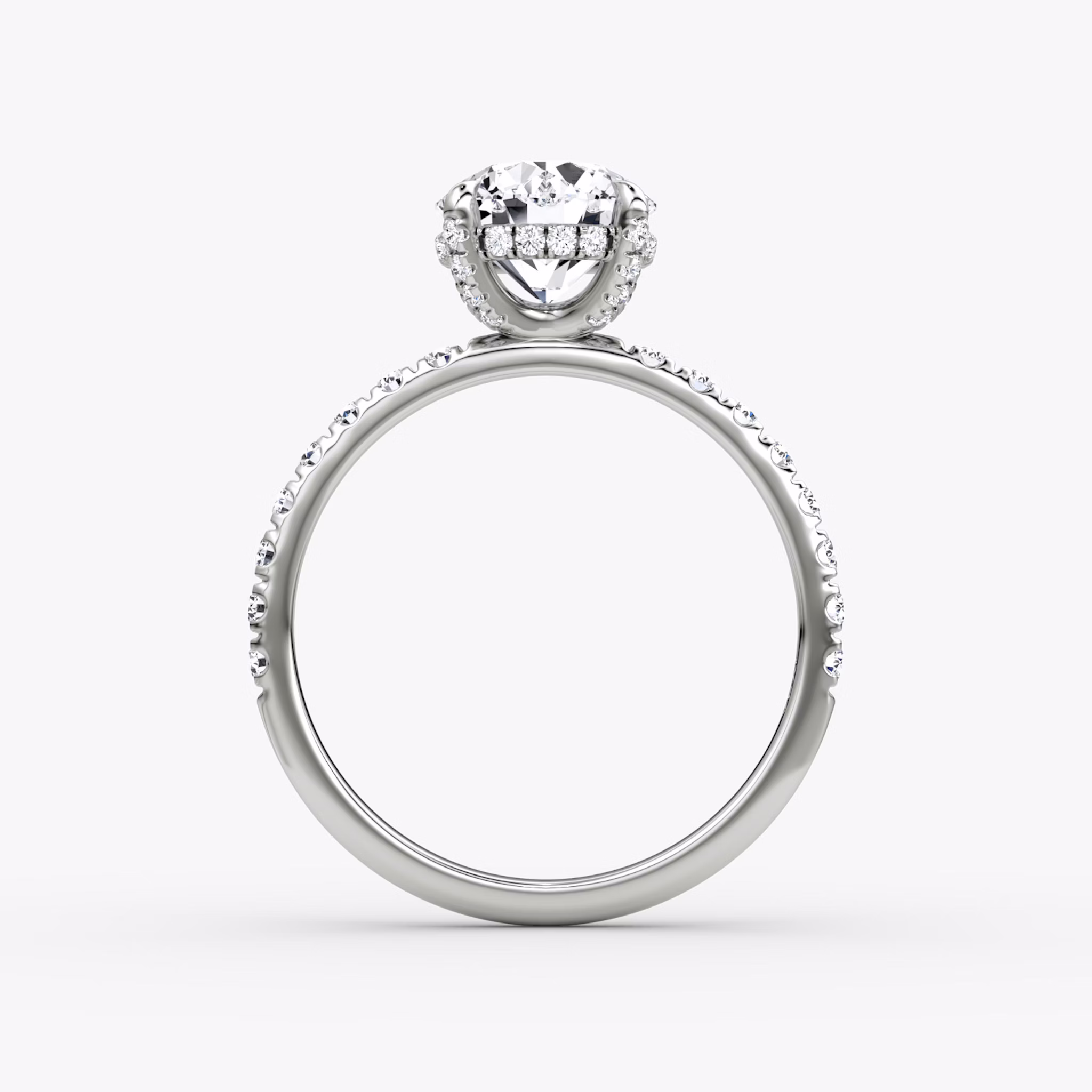 The Classic Hidden Halo | Round Brilliant | 18k | White Gold | bandAccent: Pavé | bandWidth: large | caratWeight: 1.0ct | prongStyle: Pavé | diamondOrientation: vertical
