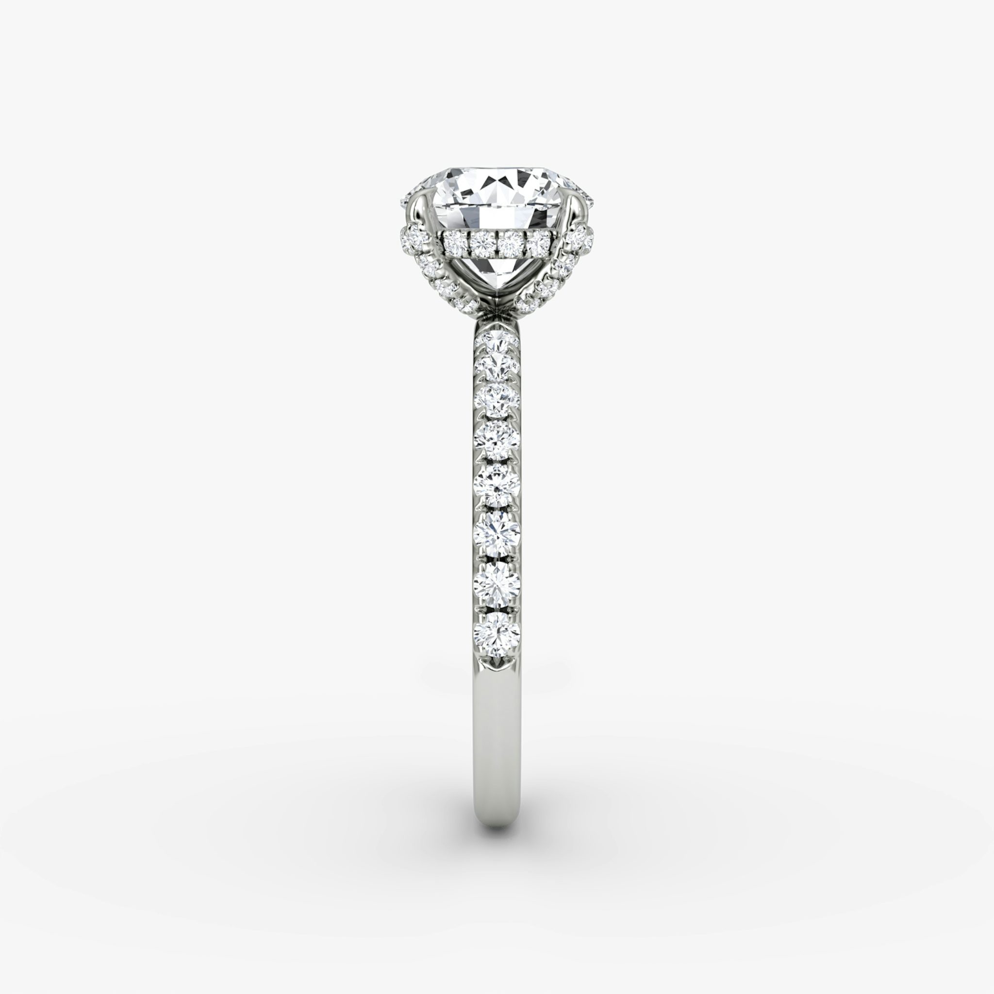 The Classic Hidden Halo | Round Brilliant | 18k | White Gold | bandAccent: Pavé | bandWidth: large | caratWeight: 1.0ct | prongStyle: Pavé | diamondOrientation: vertical