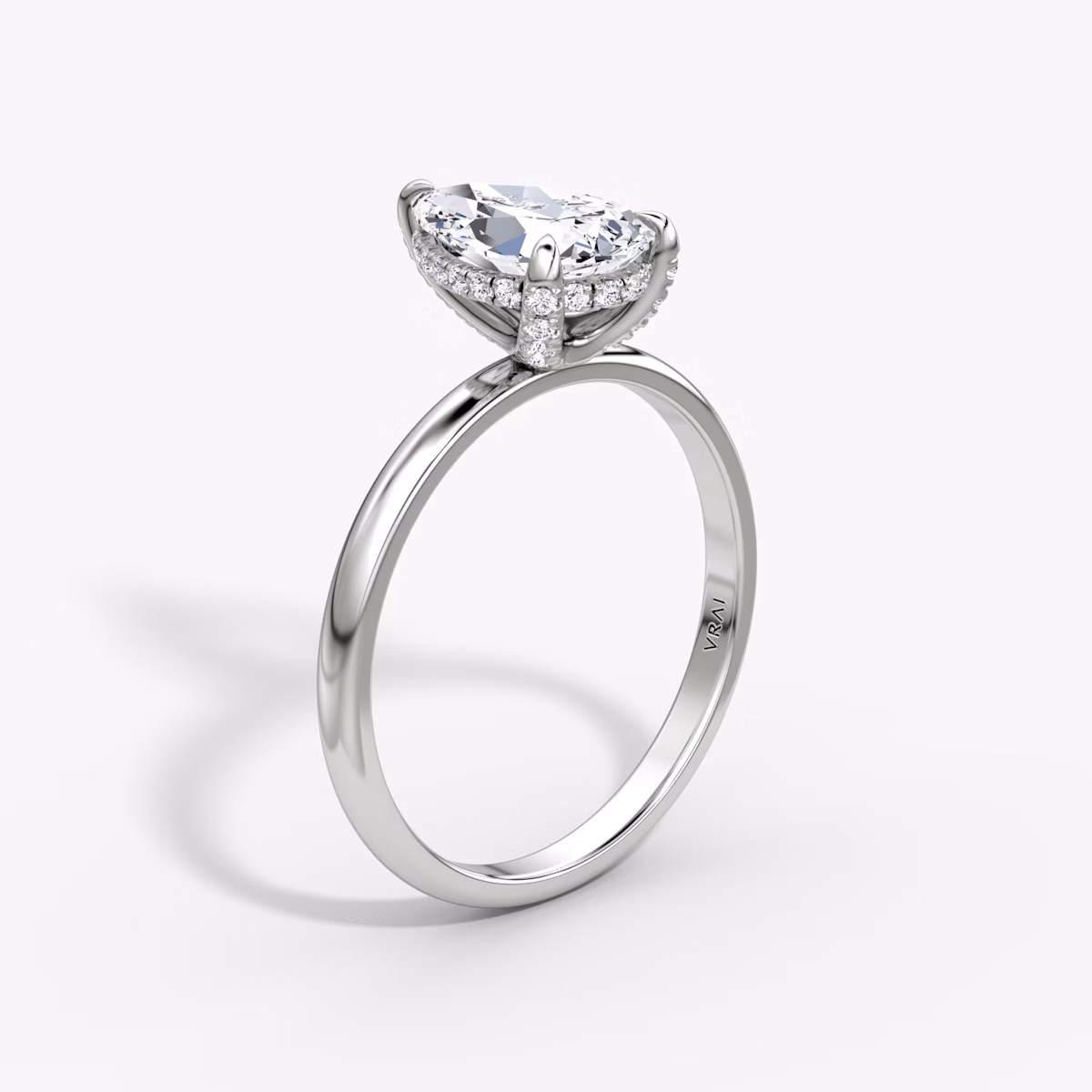 The Classic Hidden Halo | Pear | 18k | White Gold | bandAccent: Plain | bandWidth: large | prongStyle: Pavé | diamondOrientation: vertical | caratWeight: other