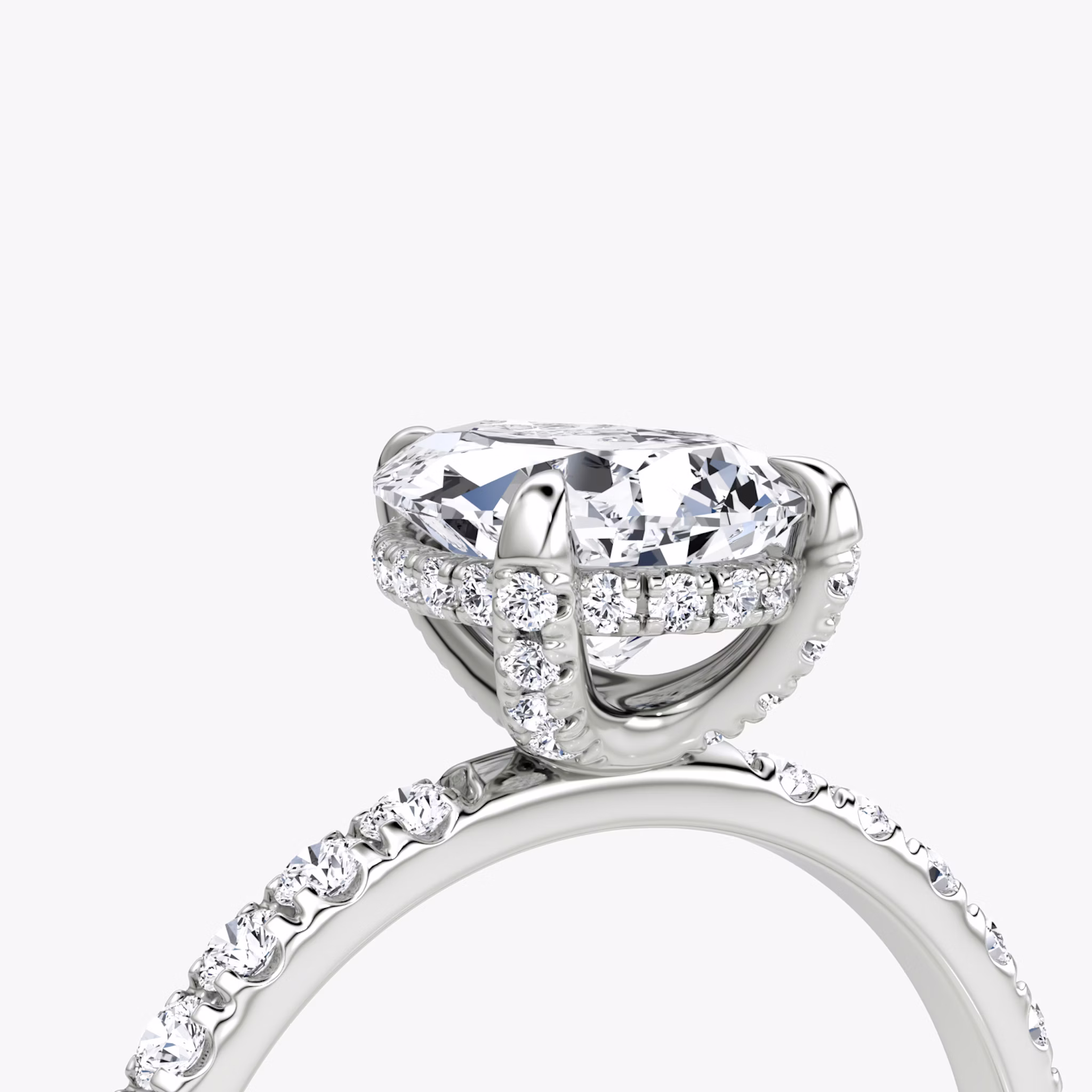 The Classic Hidden Halo | Pear | 18k | White Gold | bandAccent: Pavé | bandWidth: large | prongStyle: Pavé | diamondOrientation: vertical | caratWeight: other