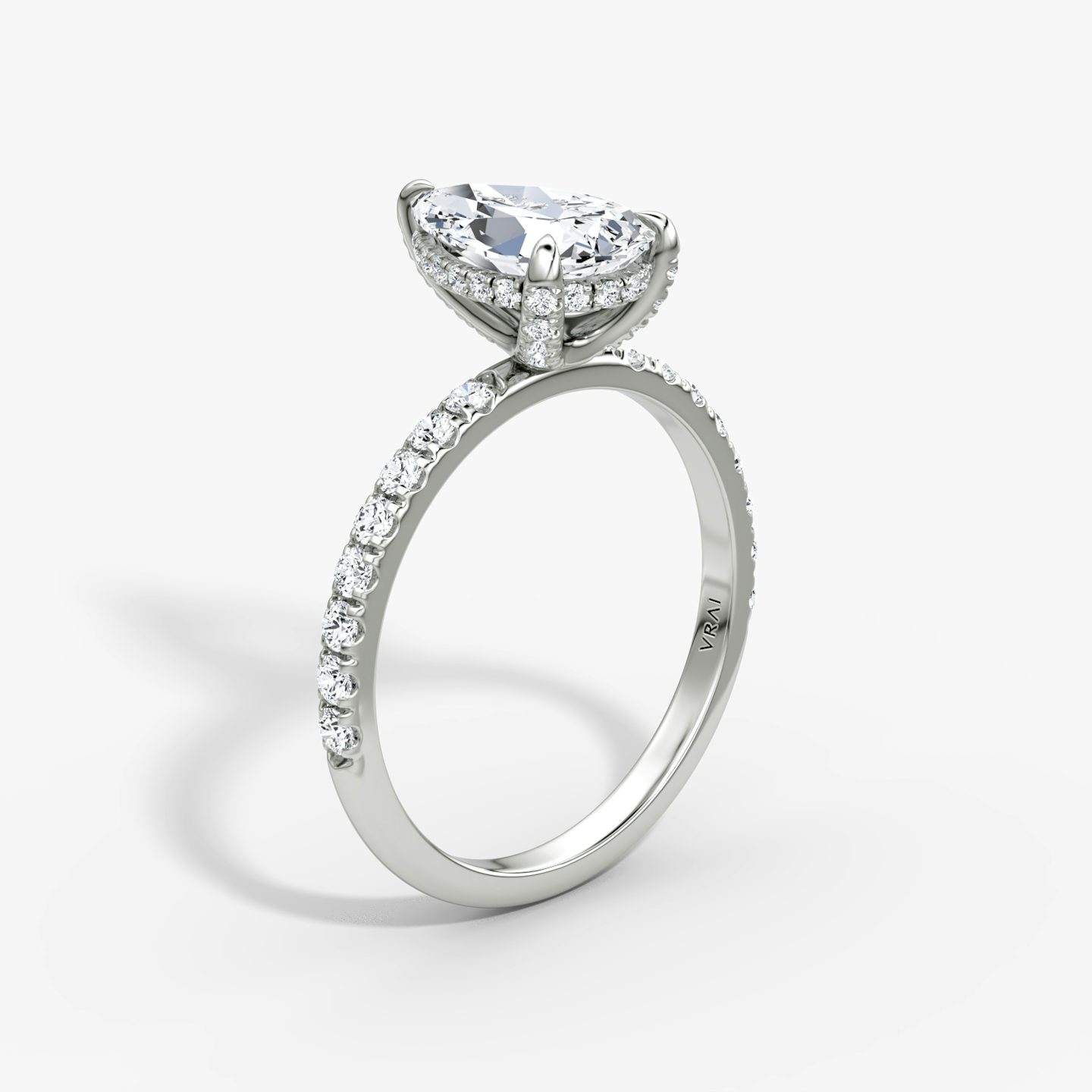 The Classic Hidden Halo | Pear | Platinum | bandAccent: Pavé | bandWidth: large | prongStyle: Pavé | diamondOrientation: vertical | caratWeight: other