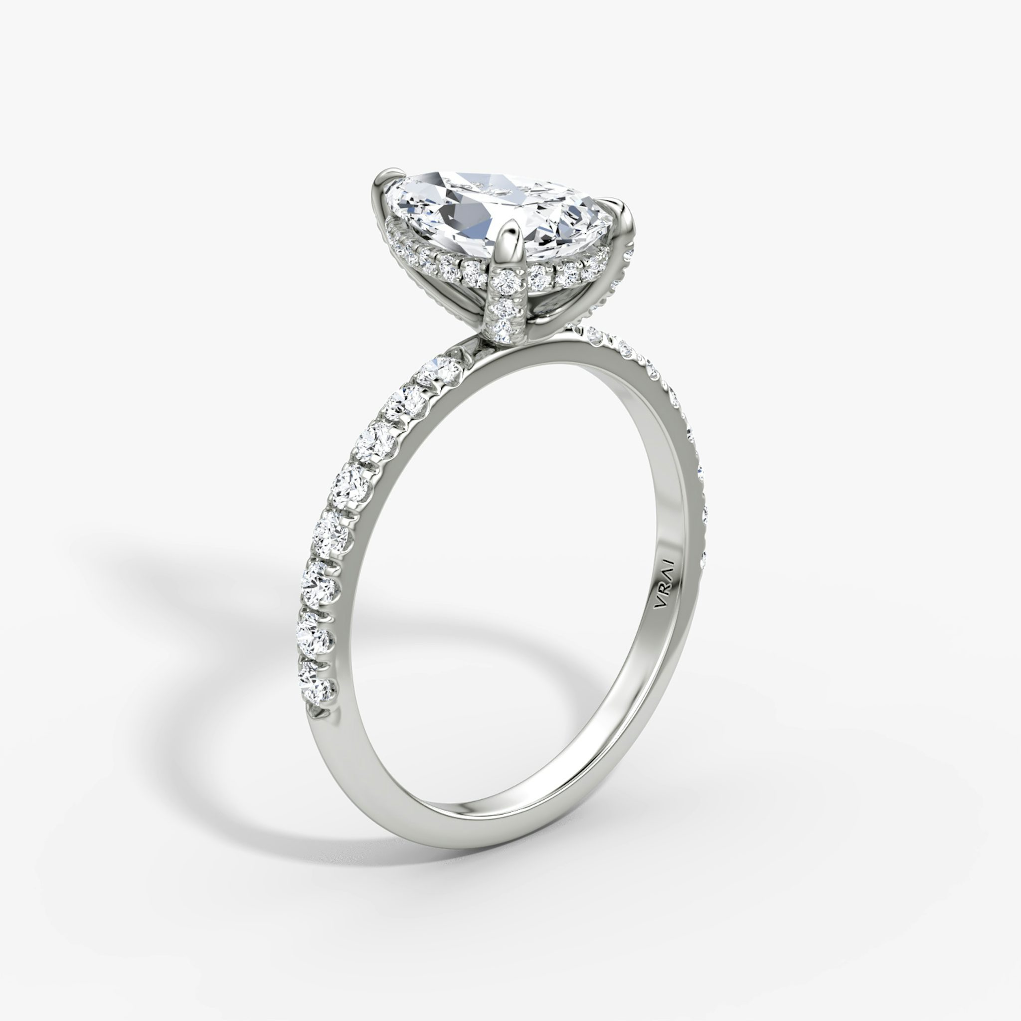 The Classic Hidden Halo | Pear | 18k | White Gold | bandAccent: Pavé | bandWidth: large | prongStyle: Pavé | diamondOrientation: vertical | caratWeight: other
