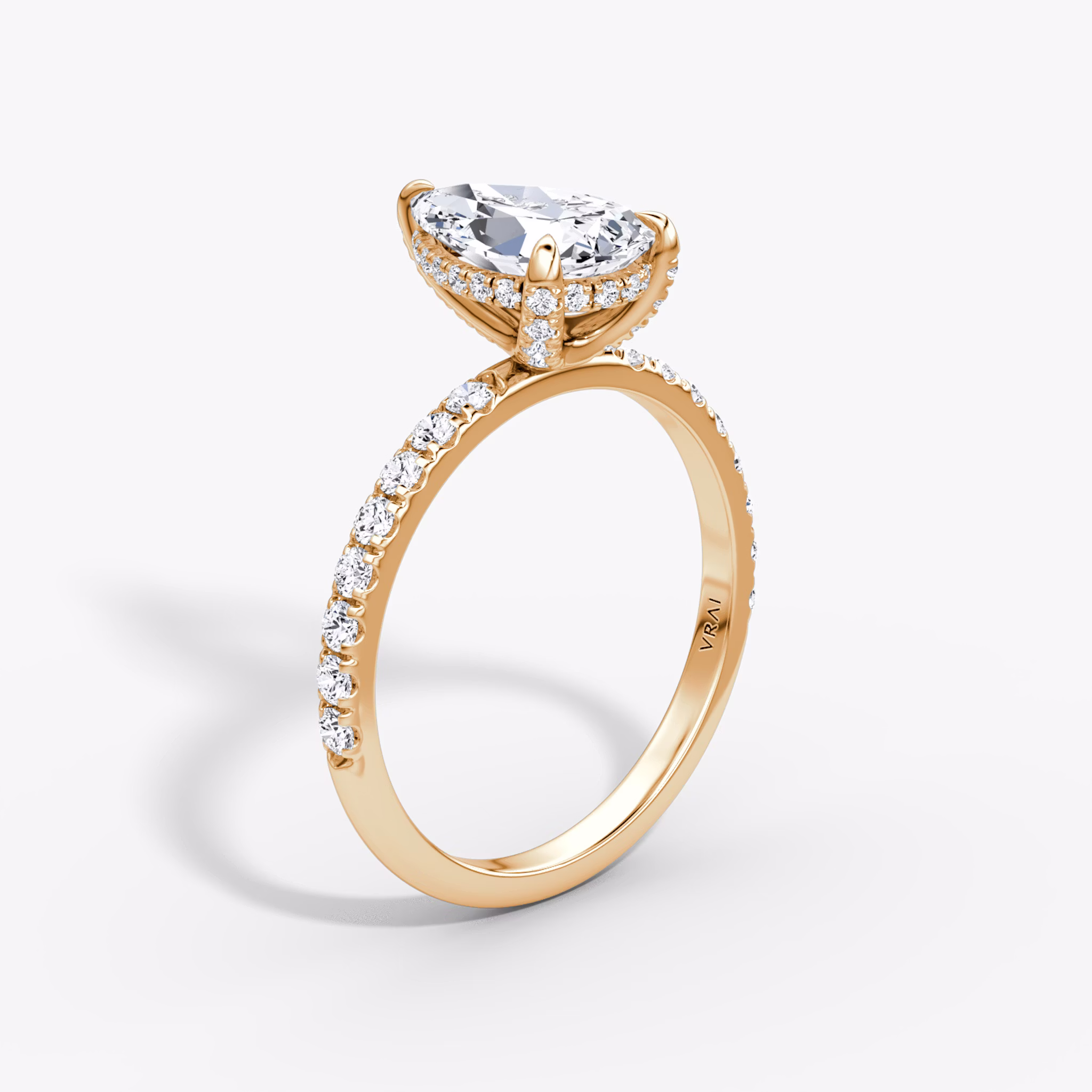 The Classic Hidden Halo | Pear | 14k | Rose Gold | bandAccent: Pavé | bandWidth: large | prongStyle: Pavé | diamondOrientation: vertical | caratWeight: other
