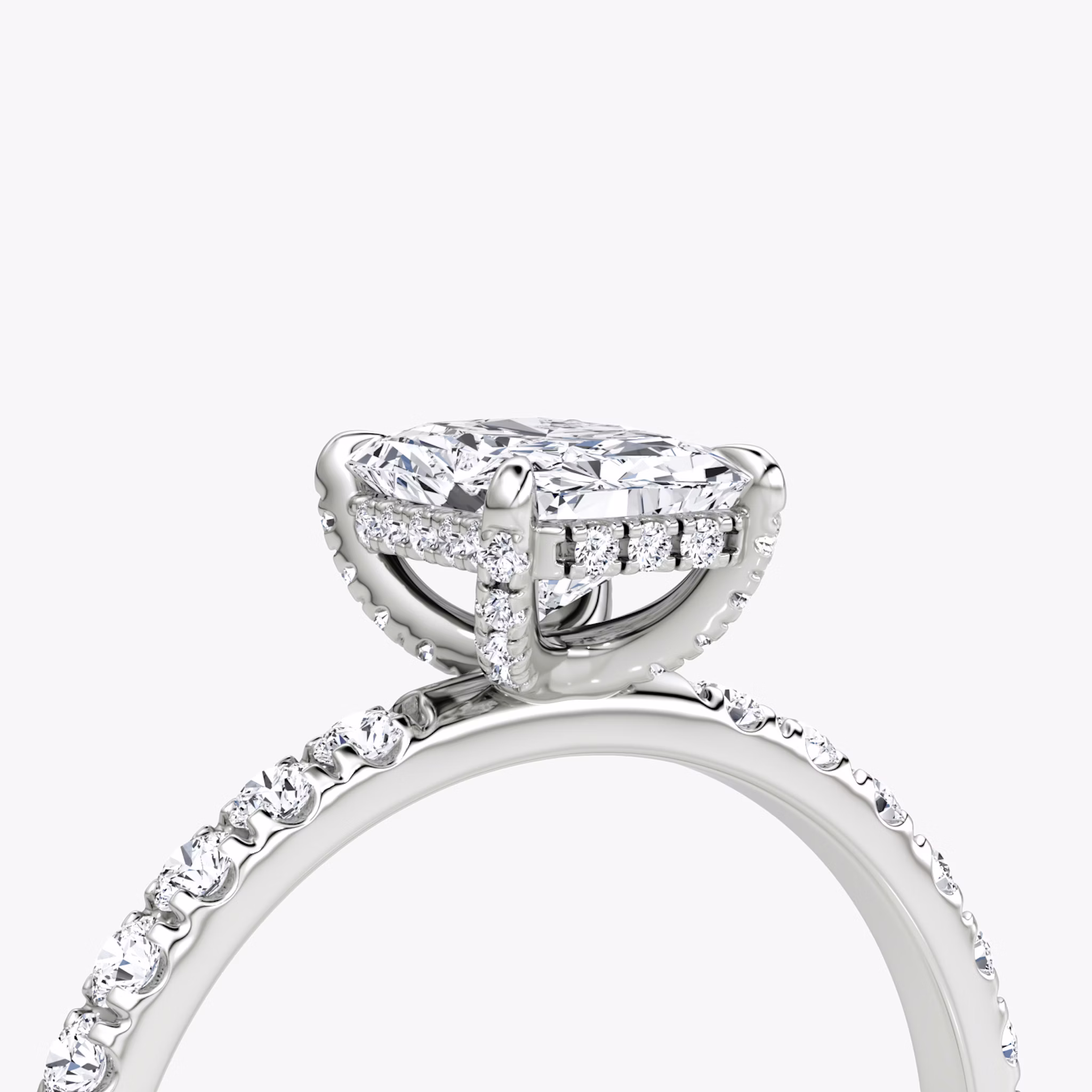 The Classic Hidden Halo | Radiant | 18k | White Gold | bandAccent: Pavé | bandWidth: large | prongStyle: Pavé | diamondOrientation: vertical | caratWeight: other