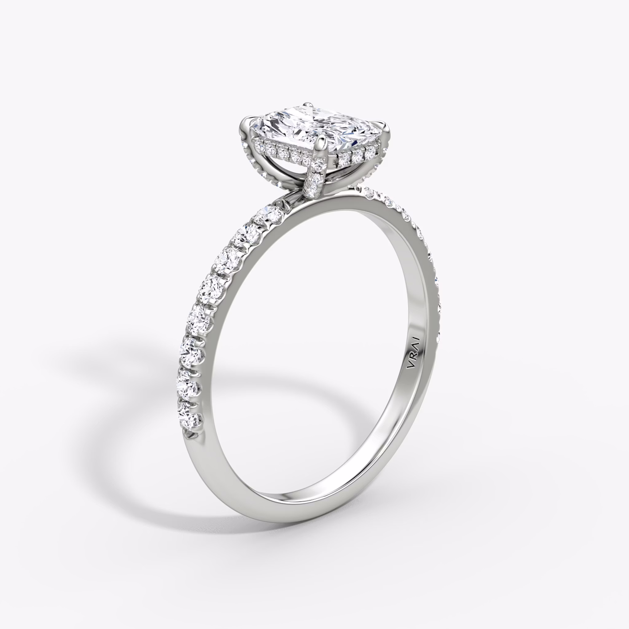 The Classic Hidden Halo | Radiant | 18k | White Gold | bandAccent: Pavé | bandWidth: large | prongStyle: Pavé | diamondOrientation: vertical | caratWeight: other