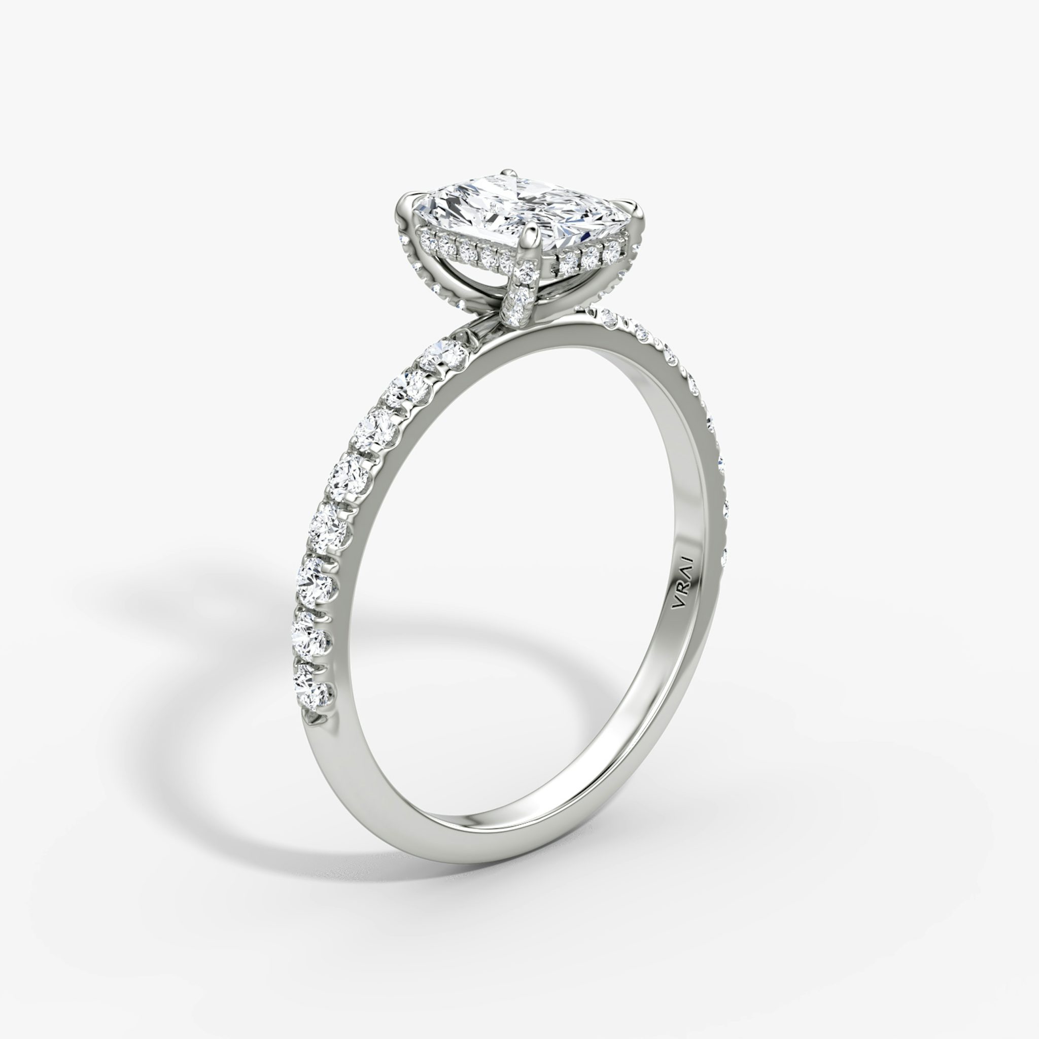 The Classic Hidden Halo | Radiant | 18k | White Gold | bandAccent: Pavé | bandWidth: large | prongStyle: Pavé | diamondOrientation: vertical | caratWeight: other