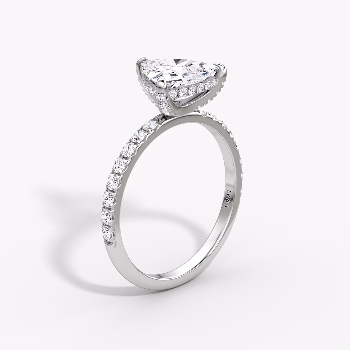 The Classic Hidden Halo | Trillion | Platinum | bandAccent: Pavé | bandWidth: large | prongStyle: Pavé | diamondOrientation: vertical | caratWeight: other