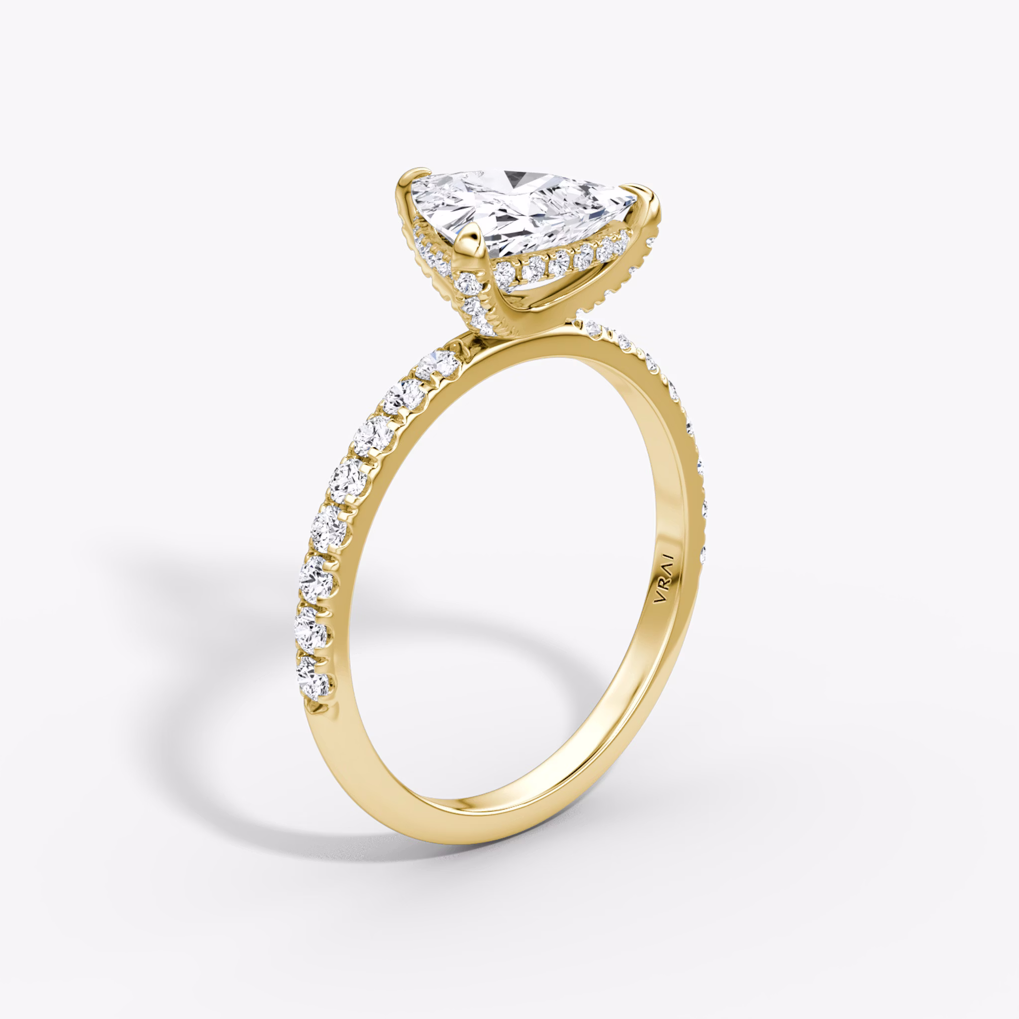 The Classic Hidden Halo | Trillion | 18k | Yellow Gold | bandAccent: Pavé | bandWidth: large | prongStyle: Pavé | diamondOrientation: vertical | caratWeight: other