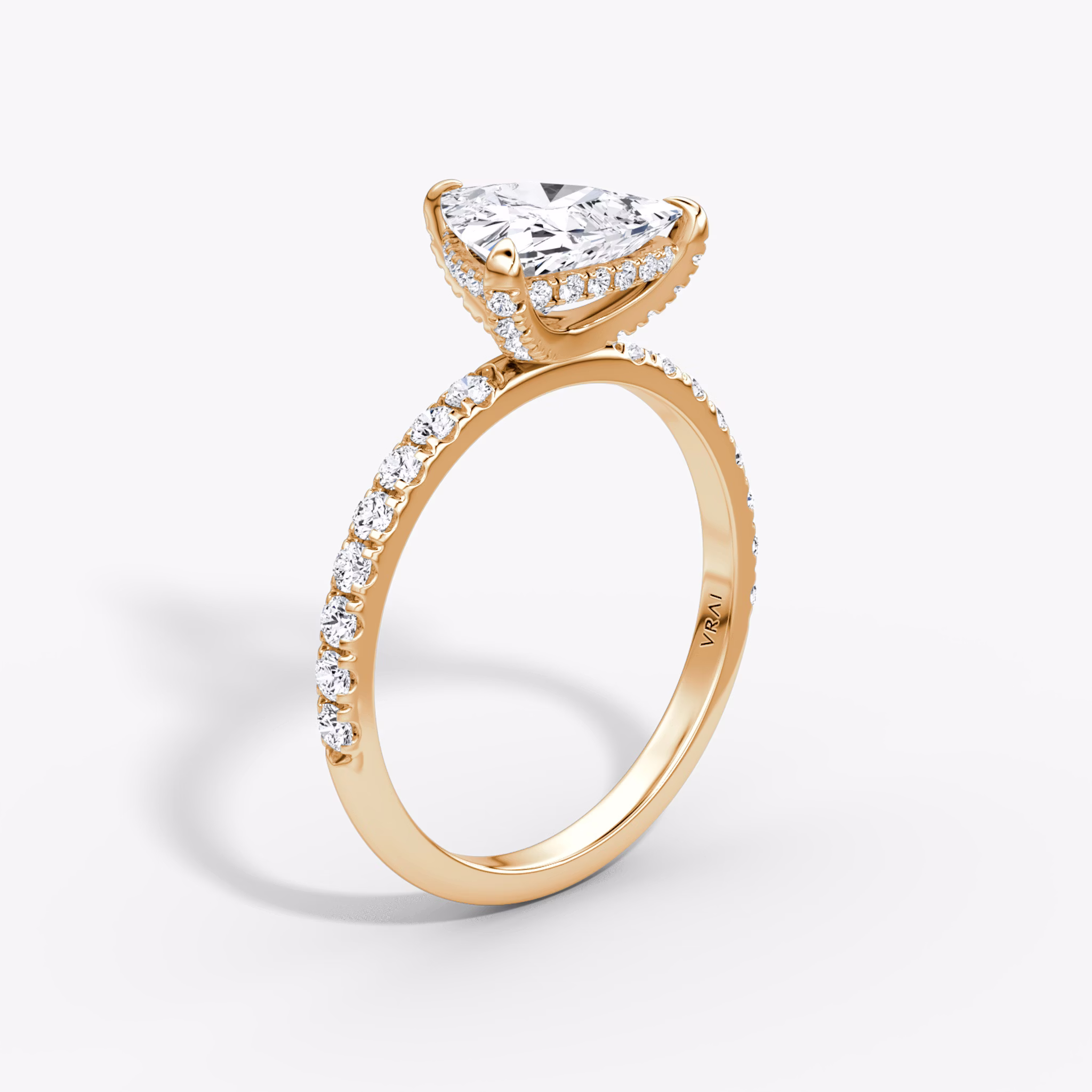 The Classic Hidden Halo | Trillion | 14k | Rose Gold | bandAccent: Pavé | bandWidth: large | prongStyle: Pavé | diamondOrientation: vertical | caratWeight: other
