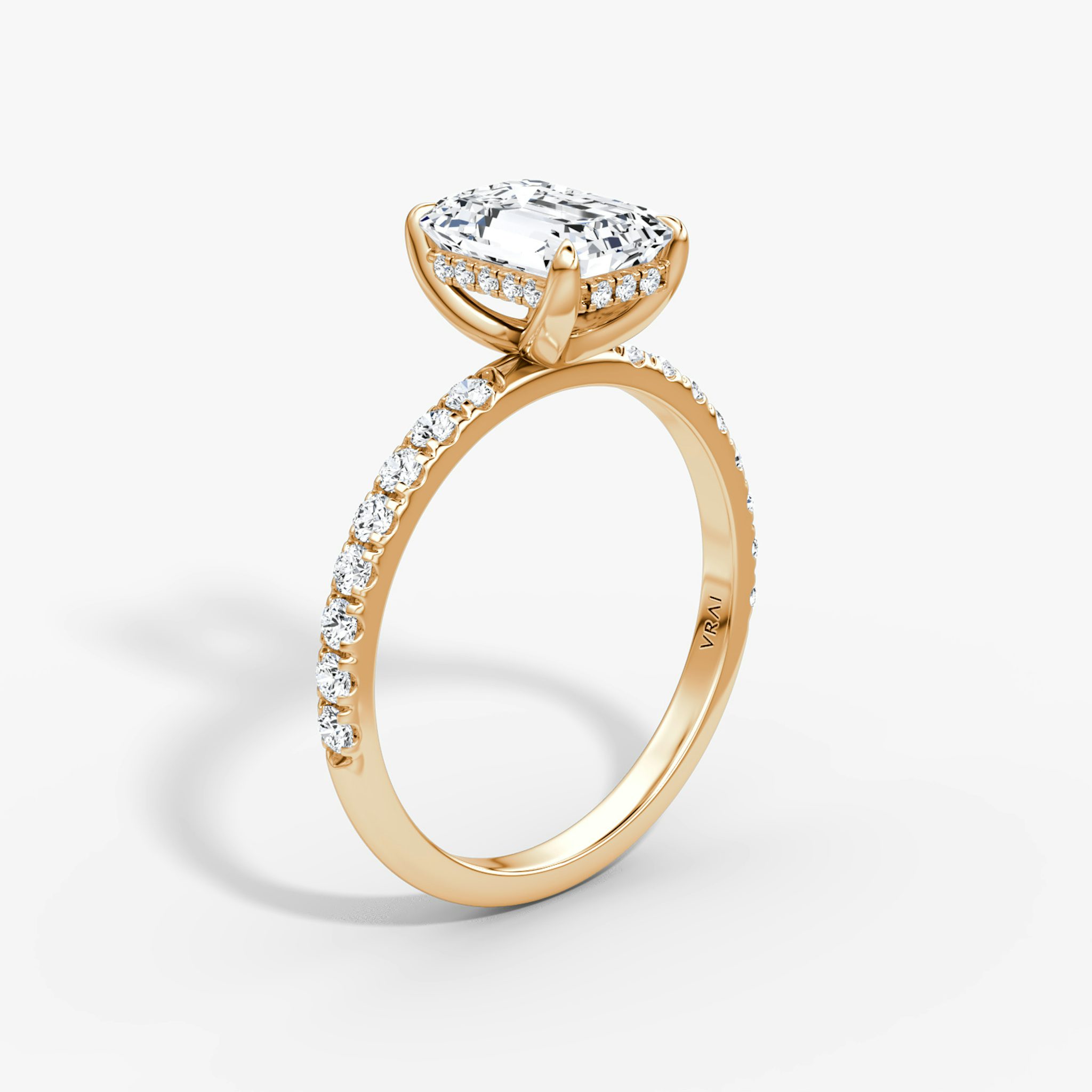 The Classic Hidden Halo | Emerald | 14k | Rose Gold | bandAccent: Pavé | bandWidth: large | prongStyle: Plain | diamondOrientation: vertical | caratWeight: other