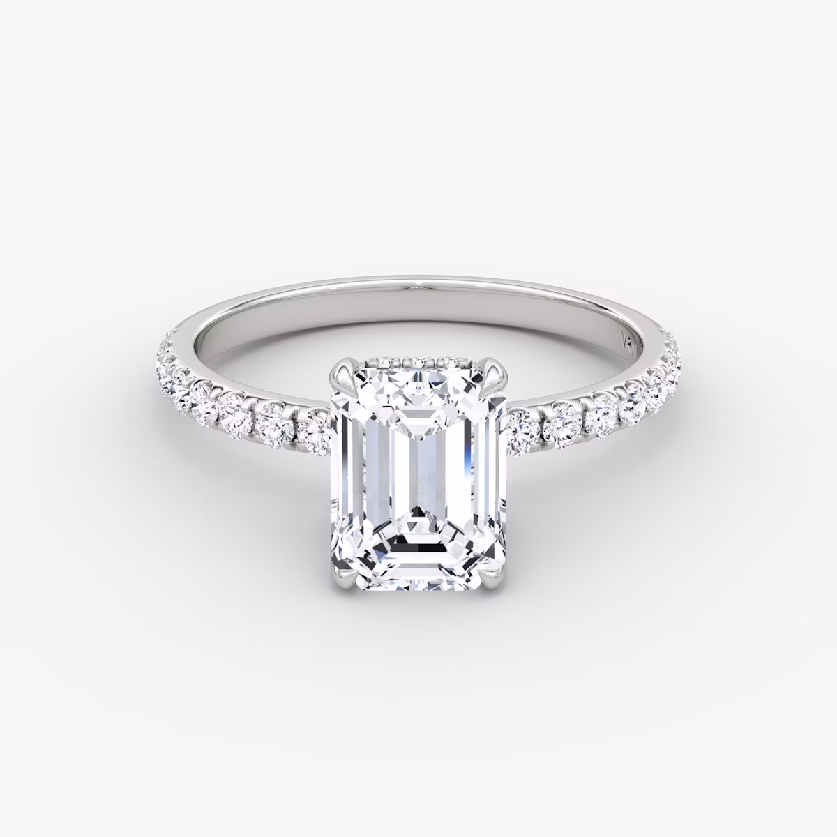 The Classic Hidden Halo | Emerald | Platinum | bandAccent: Pavé | bandWidth: large | prongStyle: Plain | diamondOrientation: vertical | caratWeight: other