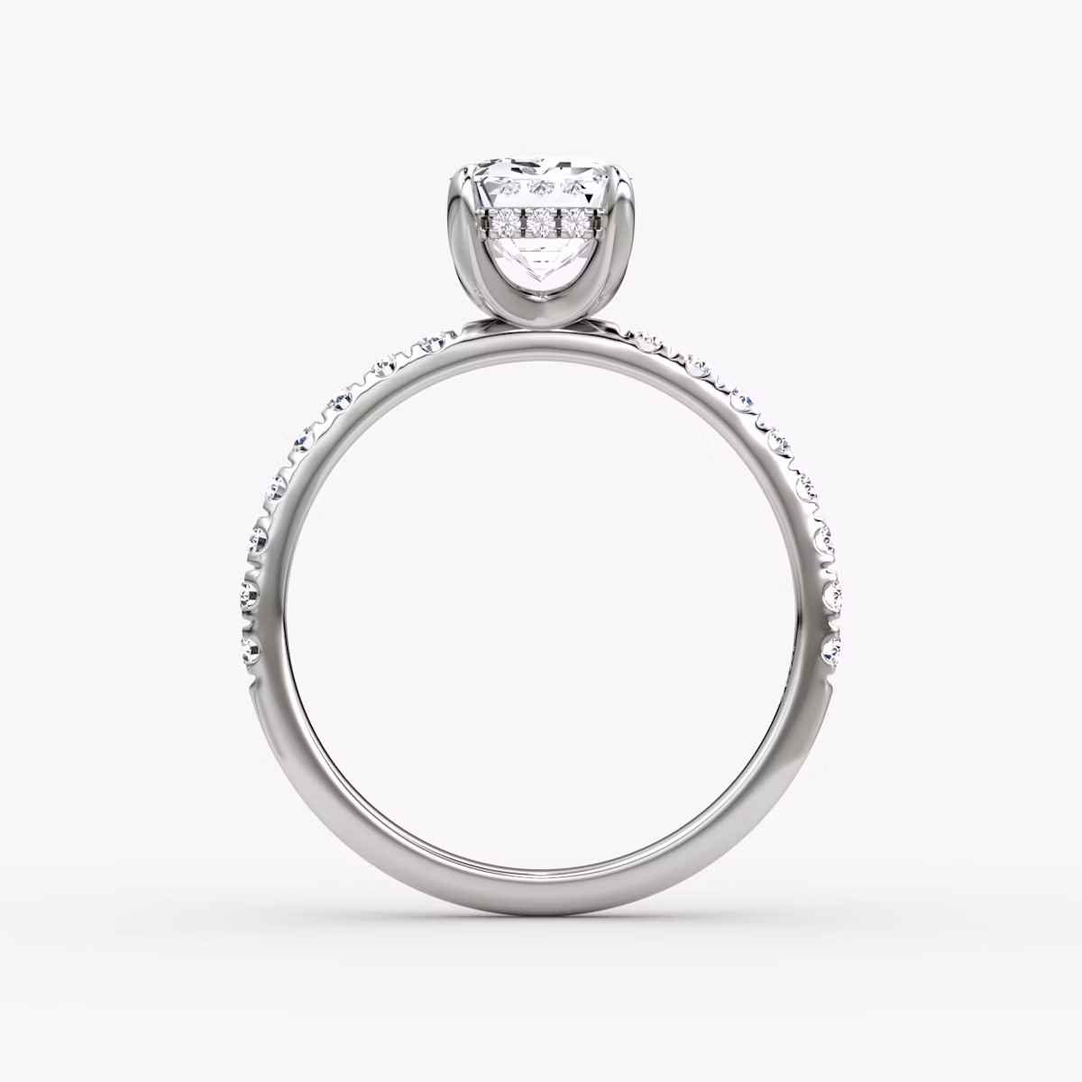 The Classic Hidden Halo | Emerald | Platinum | bandAccent: Pavé | bandWidth: large | prongStyle: Plain | diamondOrientation: vertical | caratWeight: other