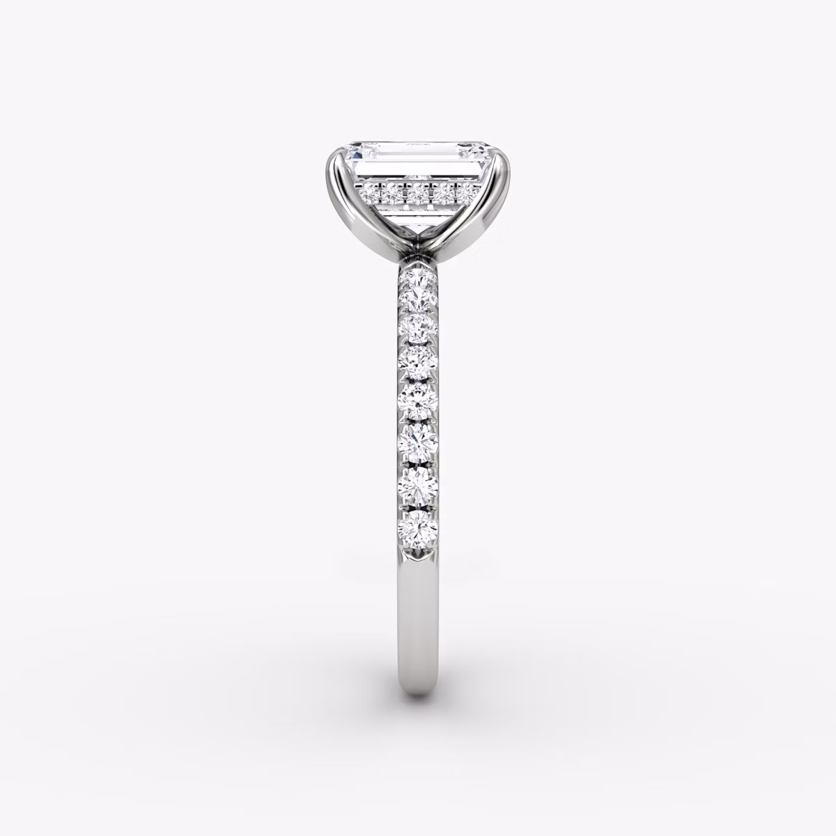 The Classic Hidden Halo | Emerald | Platinum | bandAccent: Pavé | bandWidth: large | prongStyle: Plain | diamondOrientation: vertical | caratWeight: other