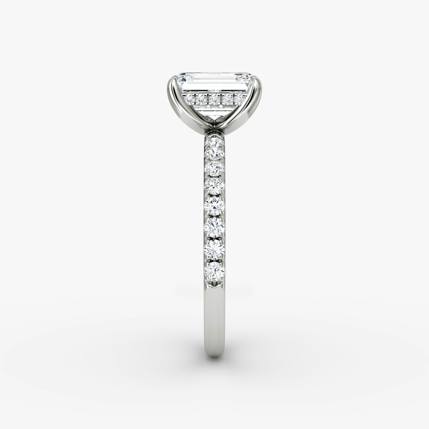 The Classic Hidden Halo | Emerald | Platinum | bandAccent: Pavé | bandWidth: large | prongStyle: Plain | diamondOrientation: vertical | caratWeight: other