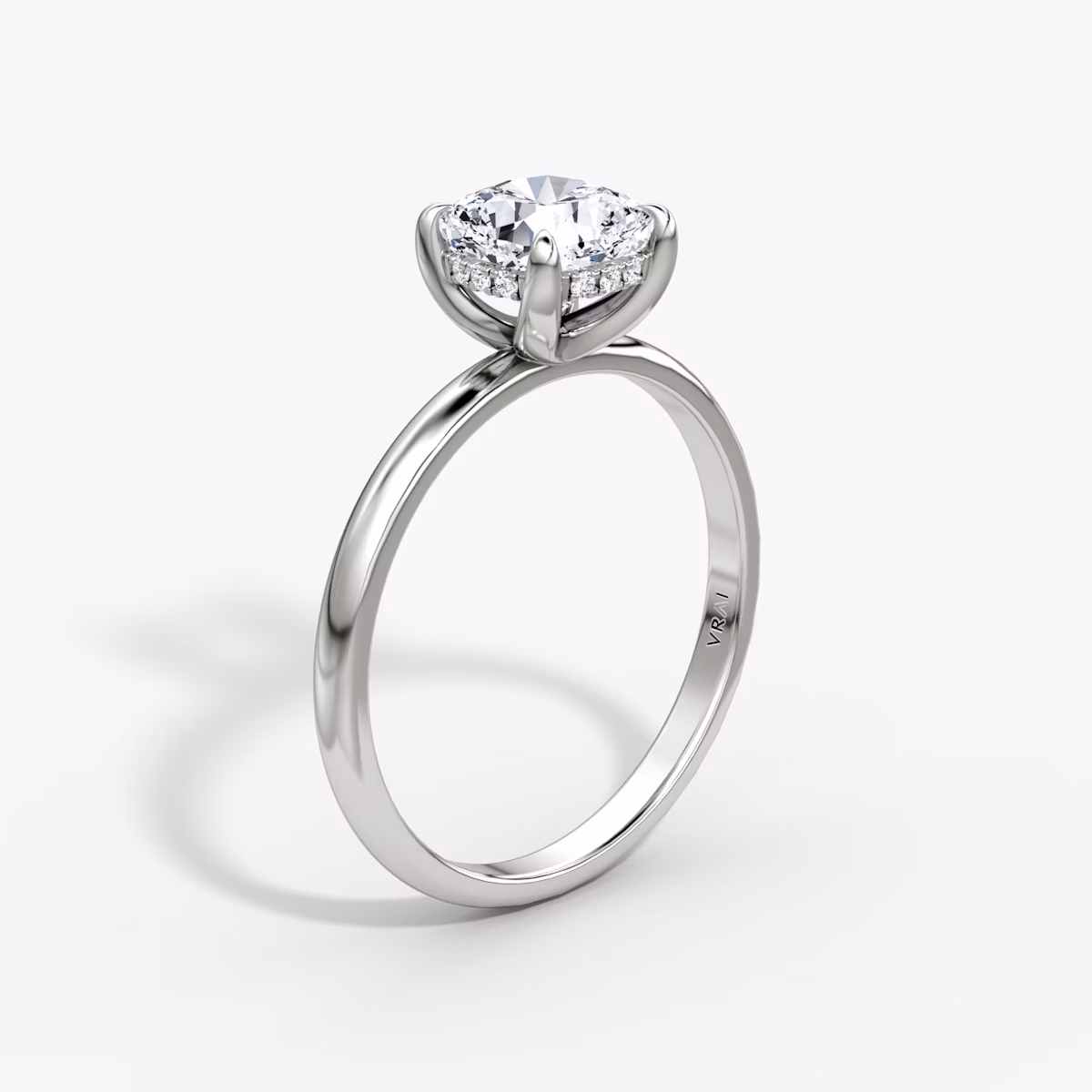 The Classic Hidden Halo | Cushion | Platinum | bandAccent: Plain | bandWidth: large | prongStyle: Plain | diamondOrientation: vertical | caratWeight: other
