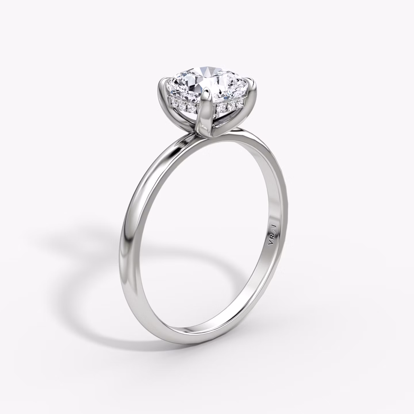The Classic Hidden Halo | Cushion | Platinum | bandAccent: Plain | bandWidth: large | prongStyle: Plain | diamondOrientation: vertical | caratWeight: other