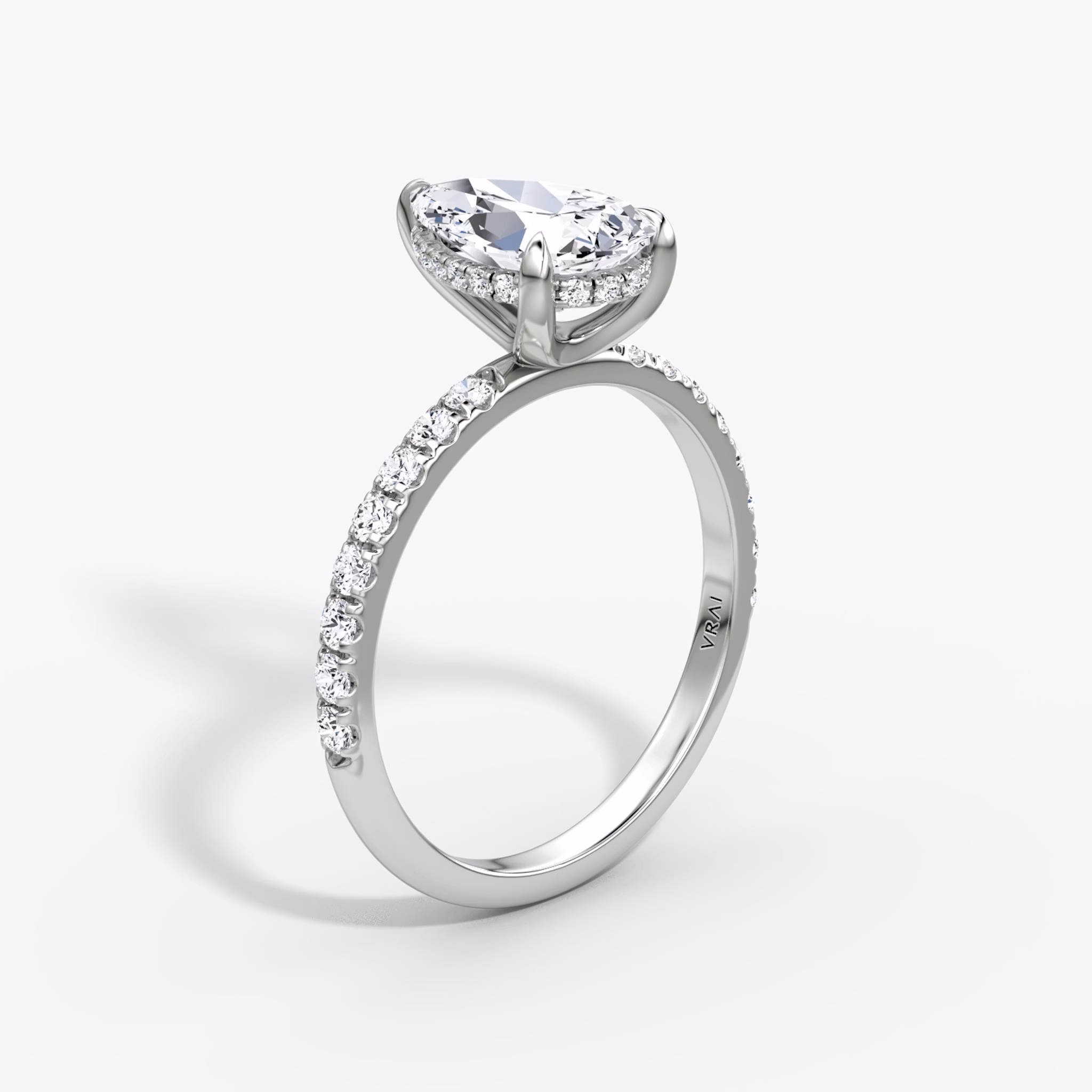 The Classic Hidden Halo | Pear | 18k | White Gold | bandAccent: Pavé | bandWidth: large | prongStyle: Plain | diamondOrientation: vertical | caratWeight: other