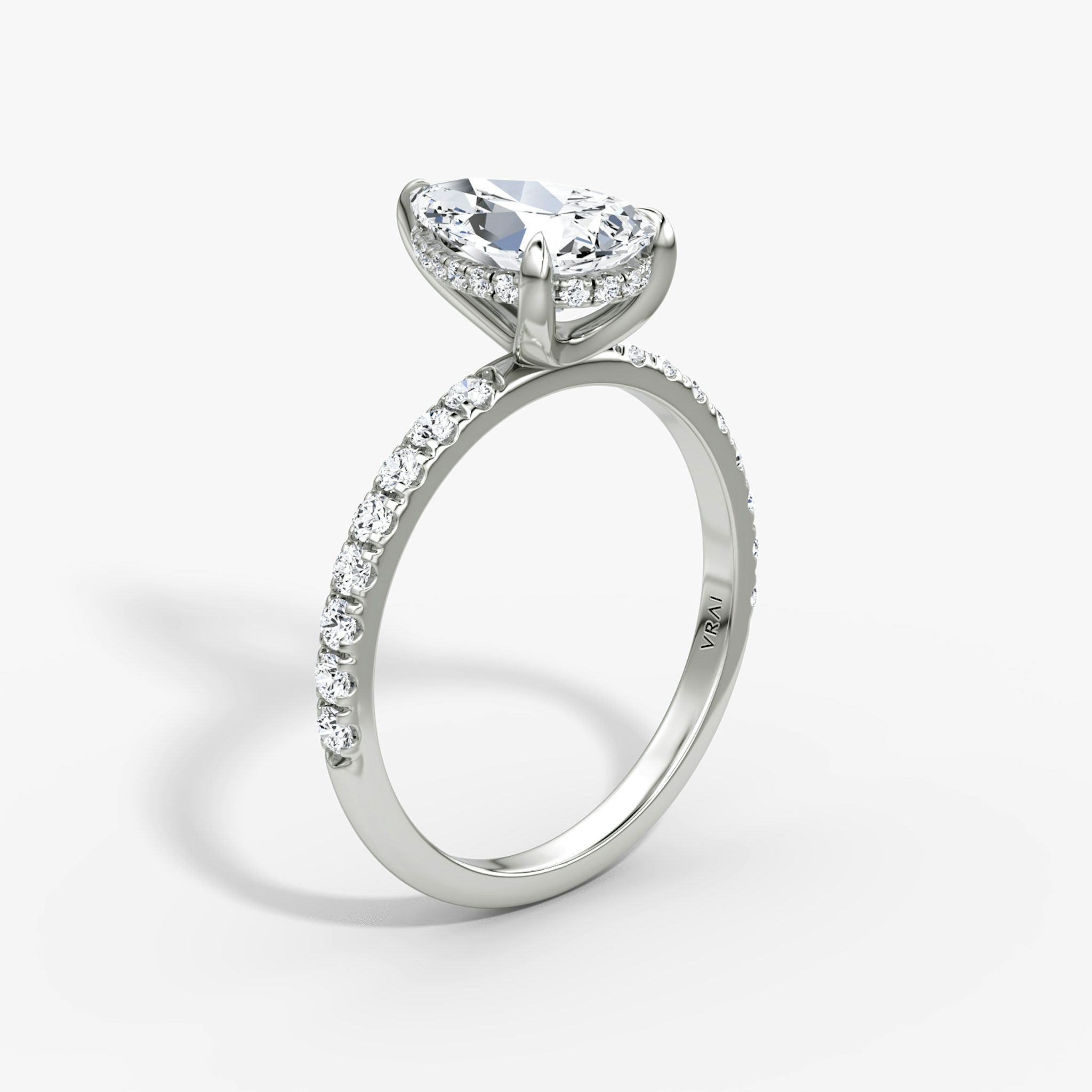 The Classic Hidden Halo | Pear | 18k | White Gold | bandAccent: Pavé | bandWidth: large | prongStyle: Plain | diamondOrientation: vertical | caratWeight: other